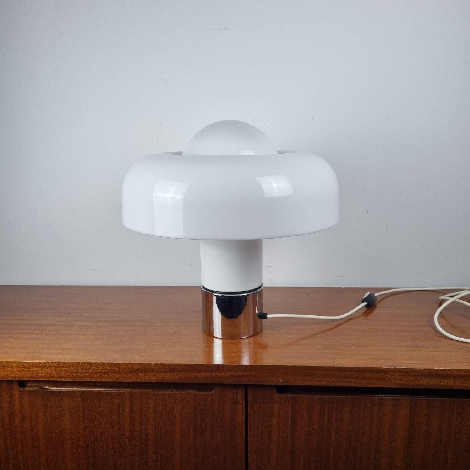 Rare table lamp model Brumbury was designed by Luigi Massoni in the late 60s for Guzzini.
It was produced by Meblo, Yugoslavia, as part of a Guzzini collection, an Italian lighting manufacturer, famous for its 60's 70's atomic lighting designs.
The
