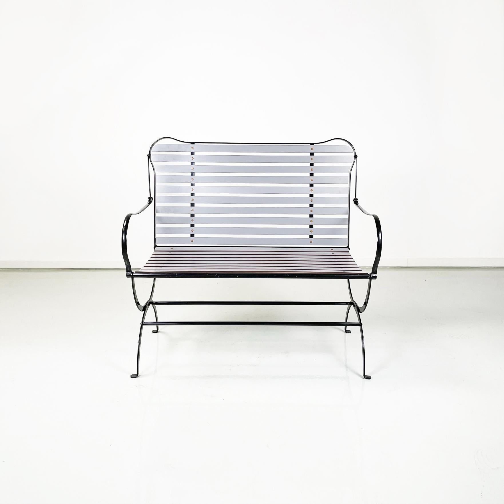 Italian modern Camilla Bench with armrests by Achille Castiglioni Zanotta, 1984
Fantastic folding bench with armrests mod. Camilla Bench with seat and back in light gray painted laminate. The structure is in black painted metal. Totally resealable.