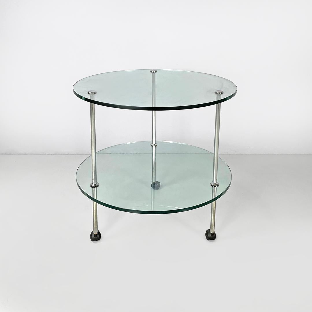 Italienische moderne Wagen T6 transparentem Glas Tops Luigi Caccia Domini Azucena, 1970er Jahre
Wagen mod. T6 mit rundem Sockel. Er hat zwei runde, transparente Glasplatten mit drei verchromten Metallstangen, die als Stützstruktur dienen und mit
