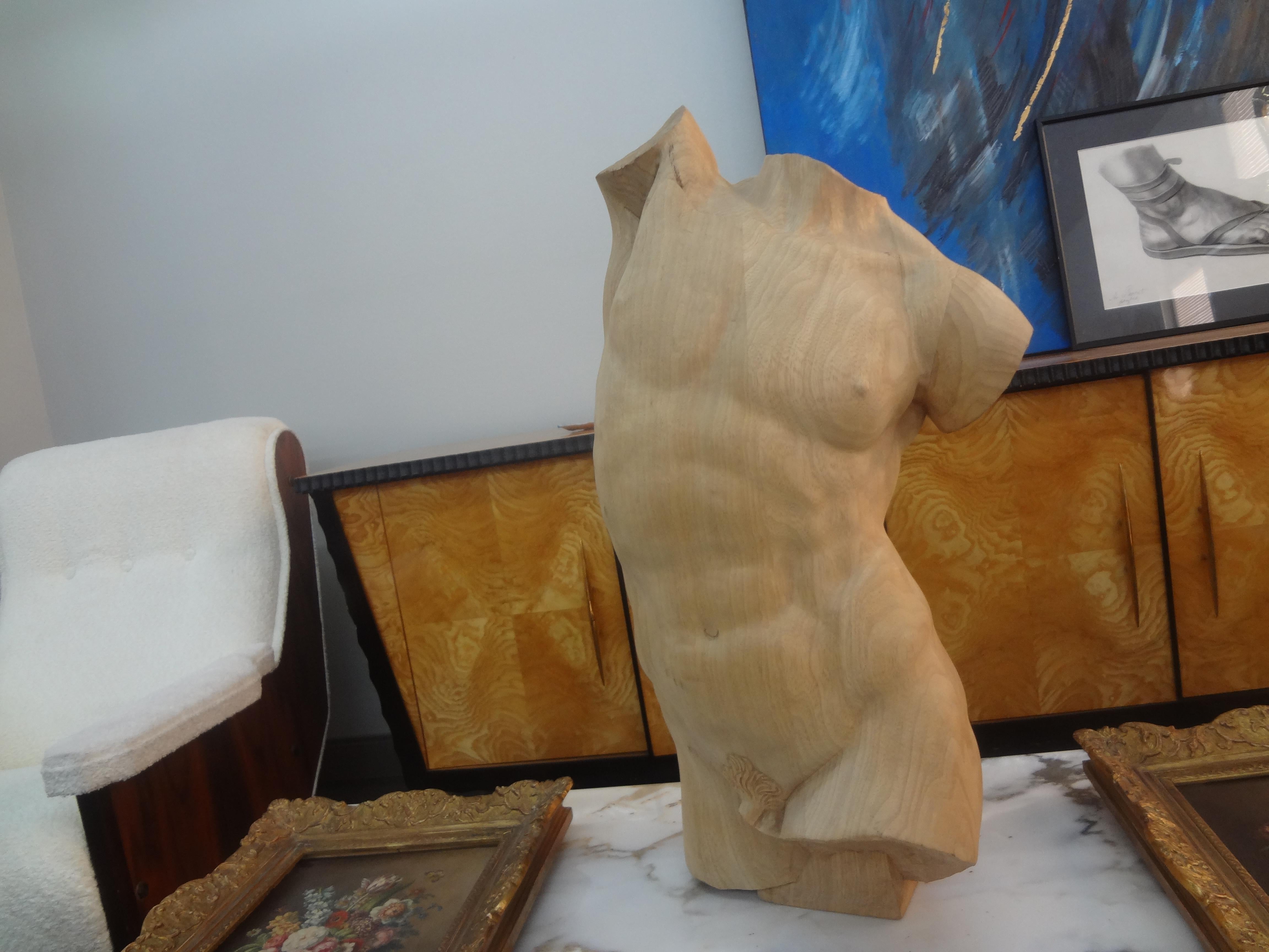 Italian Modern carved wood male torso.
This handsome large Italian male torso sculpture is expertly hand carved in fruitwood and would look great on a pedestal or on a console table or centre table.