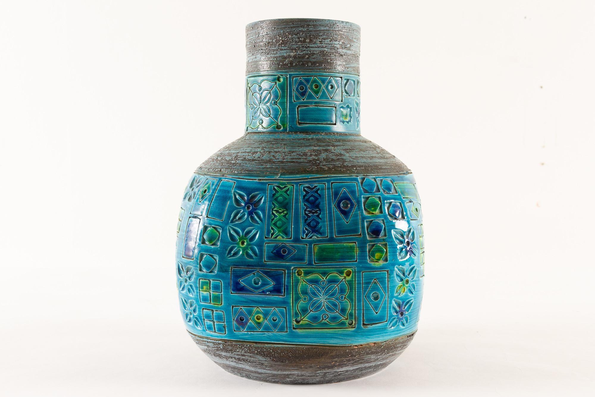 Italian Modern Ceramic vase by Aldo Londi for Bitossi, 1960s
Vintage Italian hand made vase with intricate patterns. Blue, turquoise and green glaze. 
Signed underneath.
Good original condition. Shows some signs of age through minor scuffs and