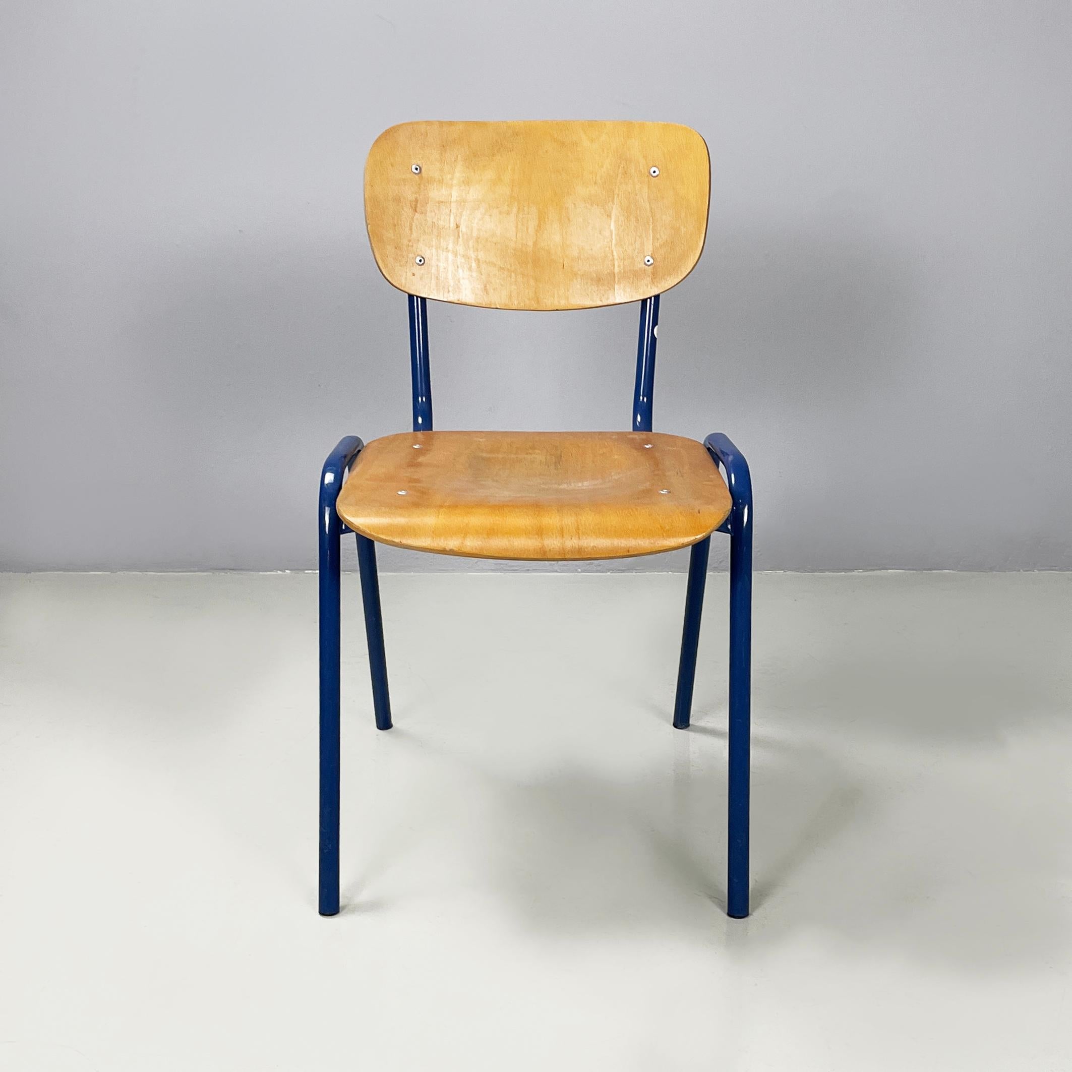 Italian modern Chair in wood and blue metal, 1970s
Chair with seat and backrest with rounded corners in light wood. The structure and legs are in blue painted metal tubing. It reminiscent of the school chair.
1970s.
Good condition. The wood shows