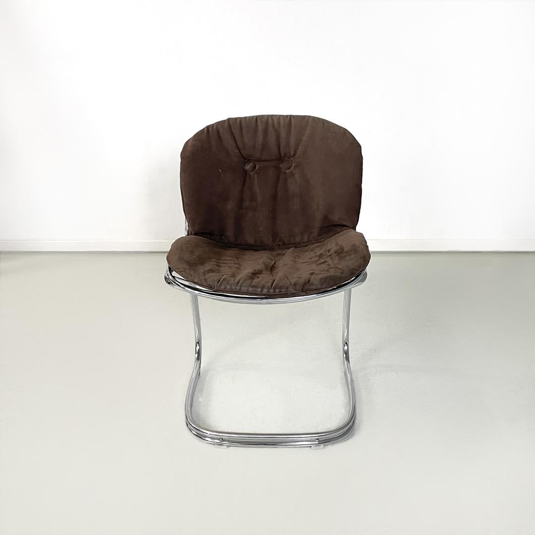 Italian modern chairs with black faux suede pillows Sabrina by Gastone Rinaldi for Rima, 1970s
Set of 6 Sabrina chairs in curved chromed steel. The seat and backrest are made of fine tubular chromed steel that follows the shape of the body. Brown