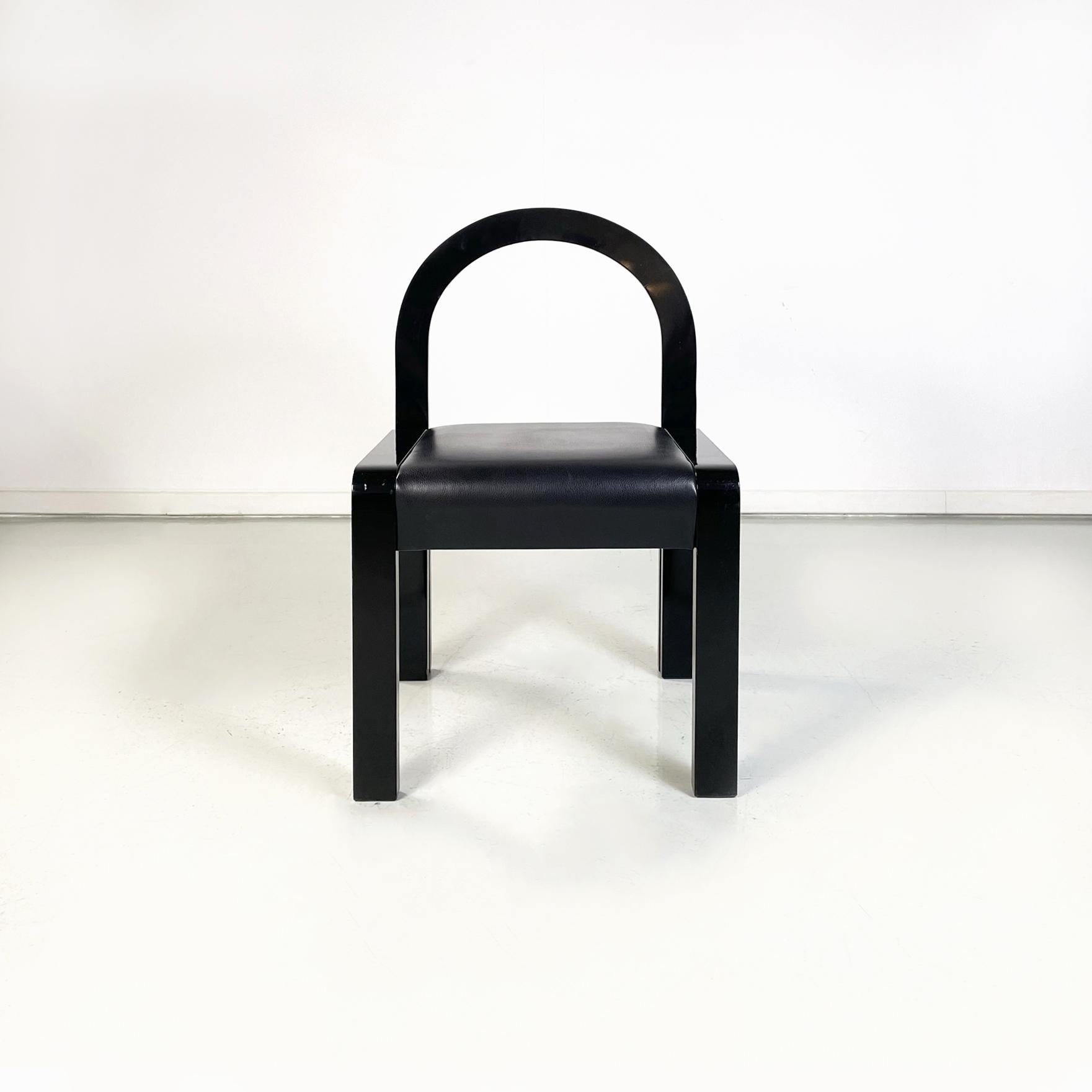 Modern Italian modern Chairs in black lacquered wood and black leather, 1980s For Sale