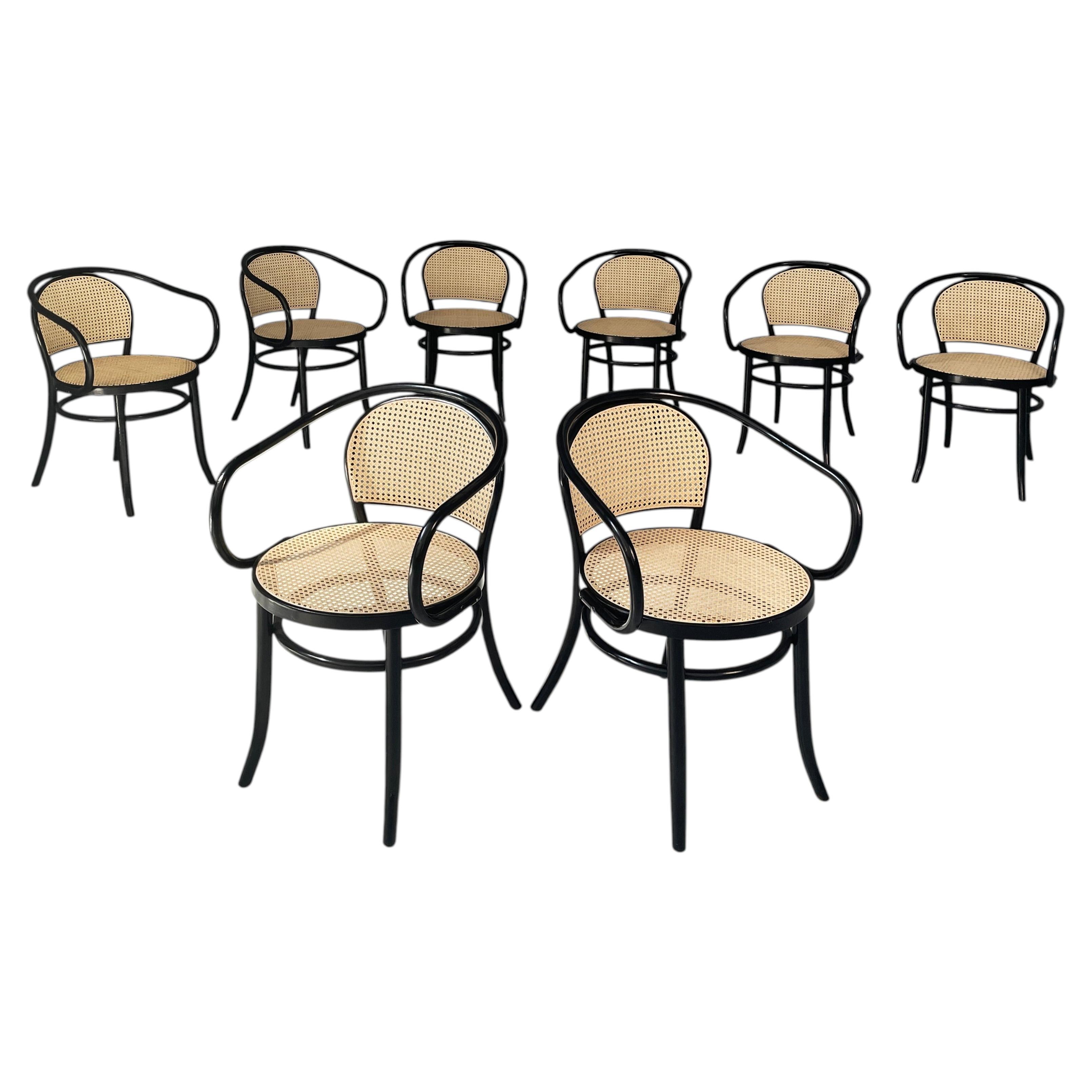 Italian modern chairs in straw and black wood, 1970s For Sale