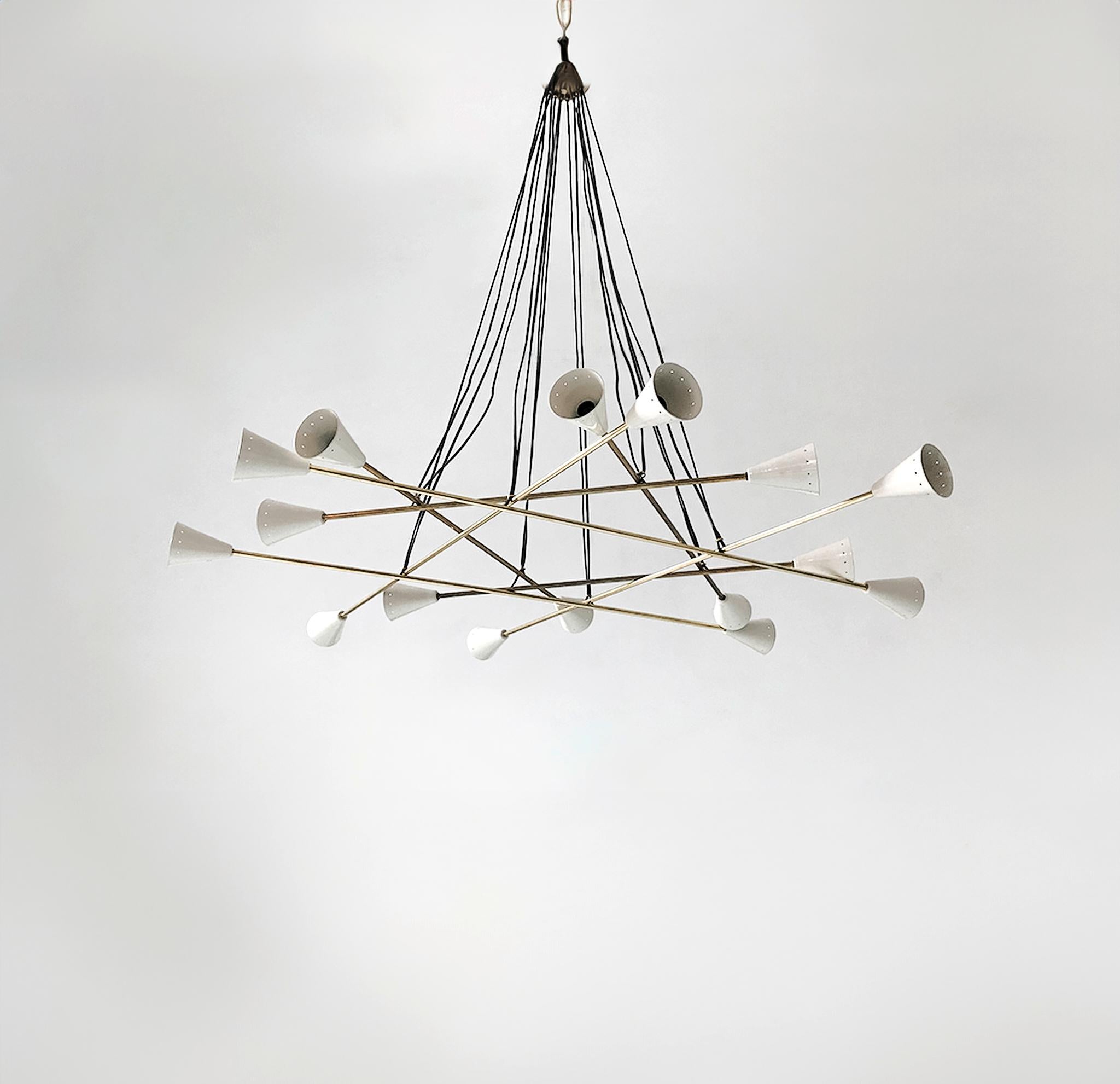 Wildly sculptural chandelier shown in un-lacquered natural brass with ivory shades fabricated in Italy by Fabio Ltd. 

This is a modern, contemporary interpretation of a classic chandelier, strongly influenced by Italian Mid-Century Modernism such