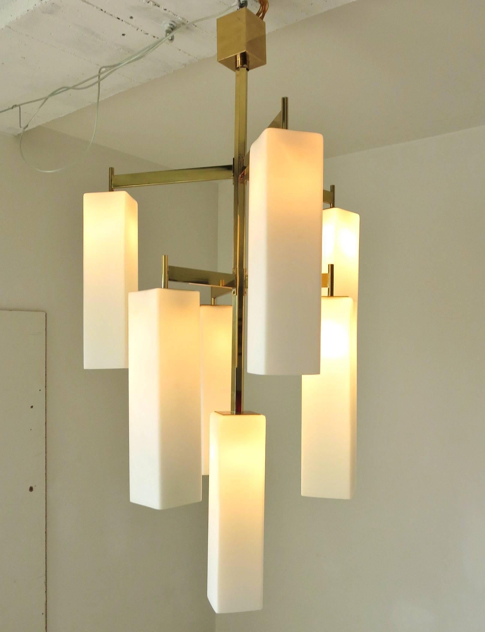 Italian modern chandelier with frosted white rectangular Murano glass shades, mounted on polished brass frame / Made in Italy 2017.