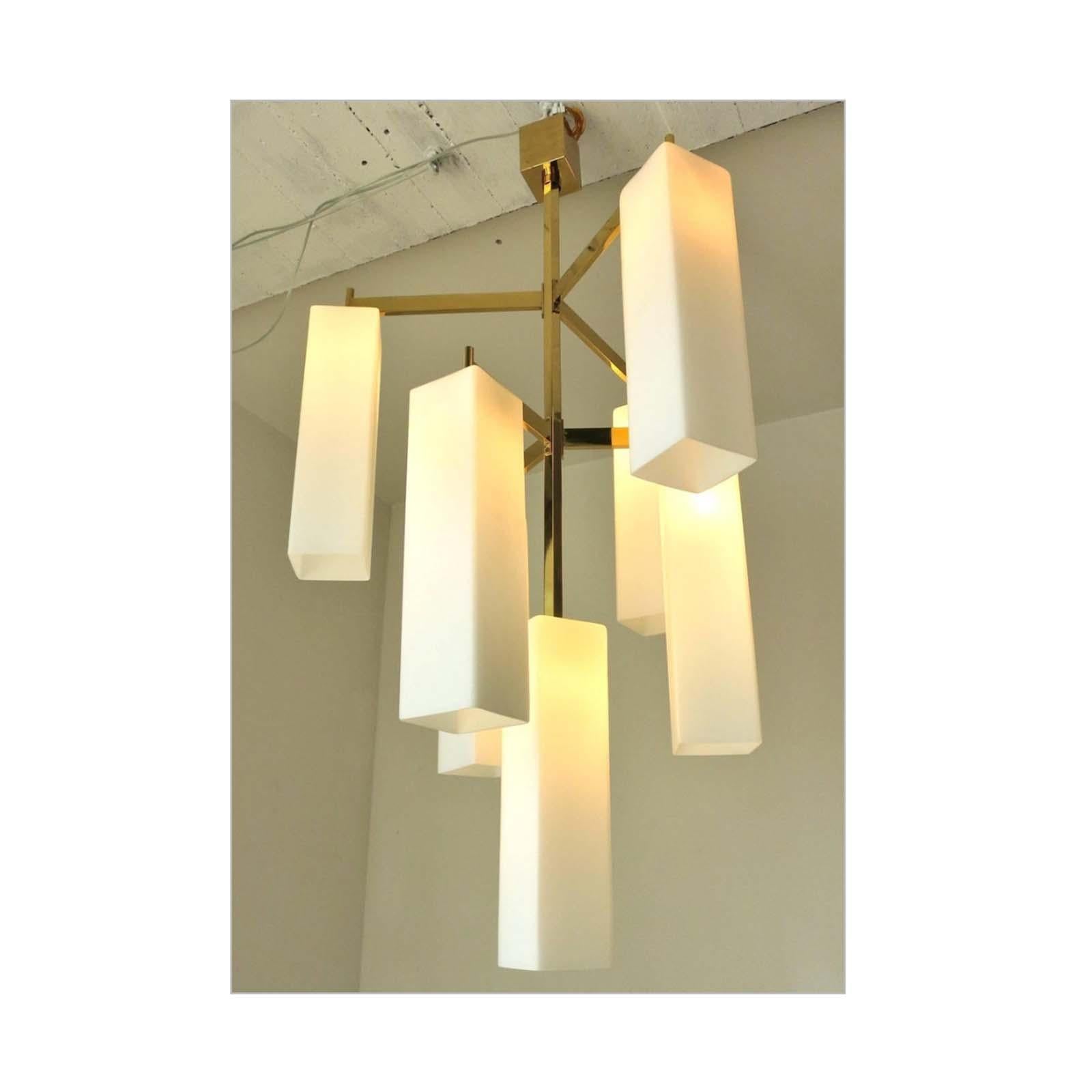 Italian modern chandelier with frosted white rectangular Murano glass shades, mounted on polished brass frame / Made in Italy 2017.