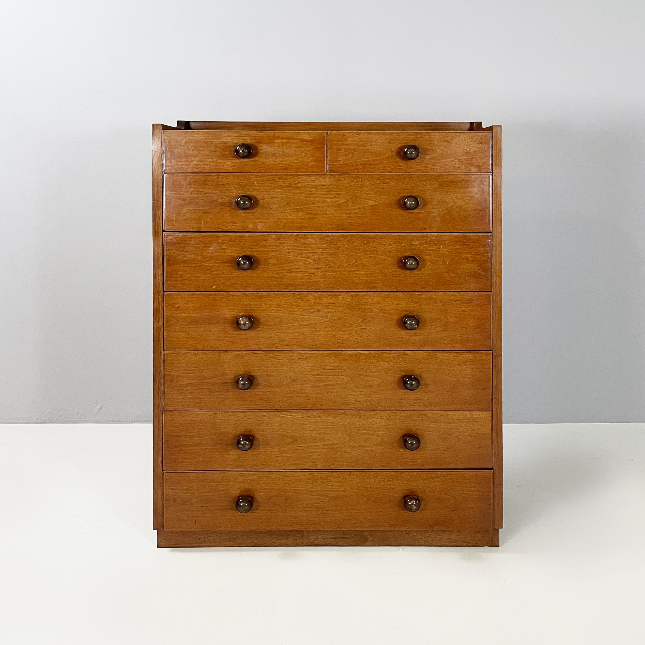 Italian modern Chest of drawers in wood with spherical handle, 1980s
Rectangular chest of drawers entirely made of wood. On the front it has 2 small and 6 large drawers. The handles are spherical.
1980s
Good conditions. Scattered light marks and