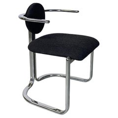 Italian modern chromed steel and black cotton rounded shapes chair, 1970s