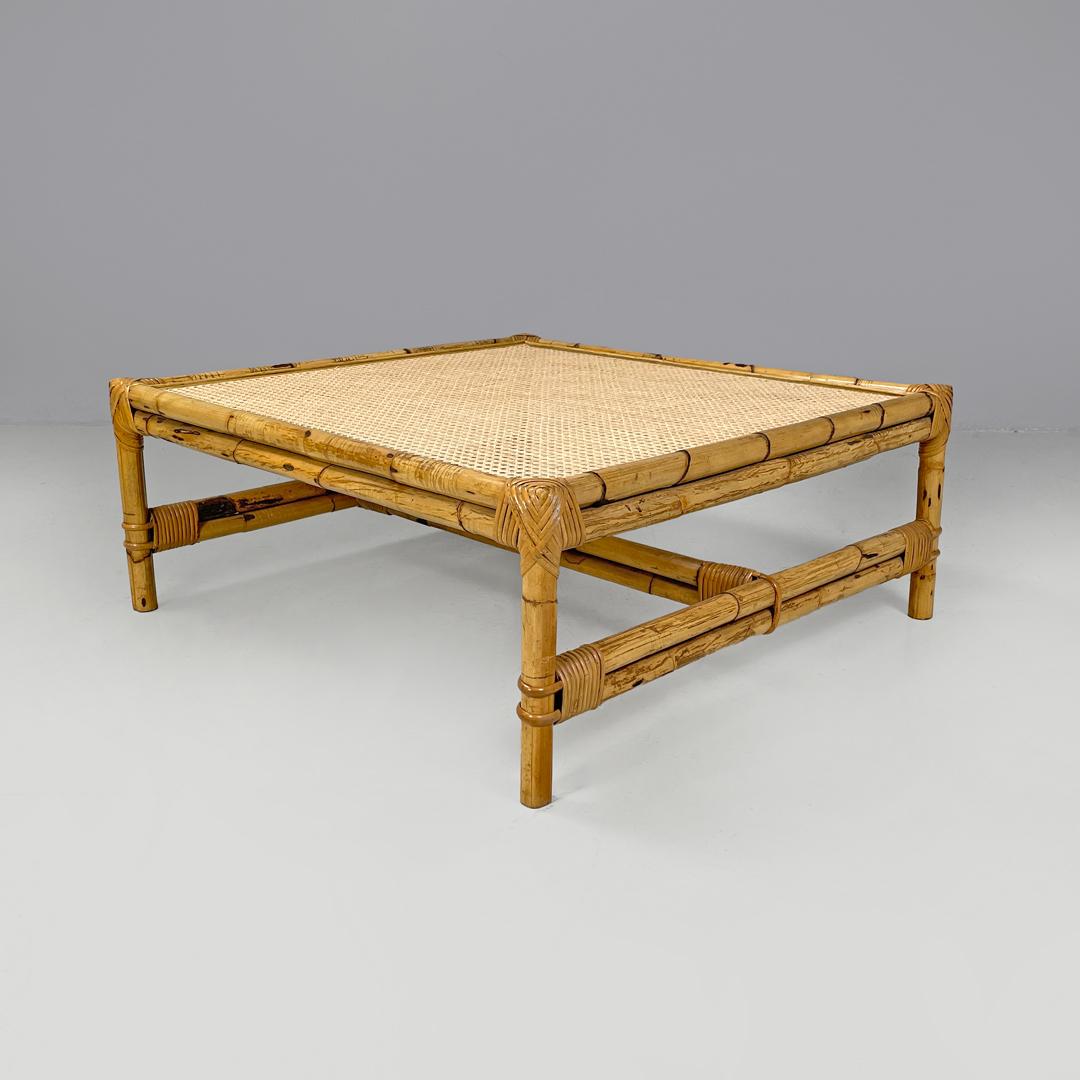Italian modern coffe table with Vienna straw top and rattan structure, 1970s
Coffee table with Vienna straw top. The structure is in rattan and bamboo, with two lateral slats and a central one.
1970s.
Good condition, the straw is new. With scattered