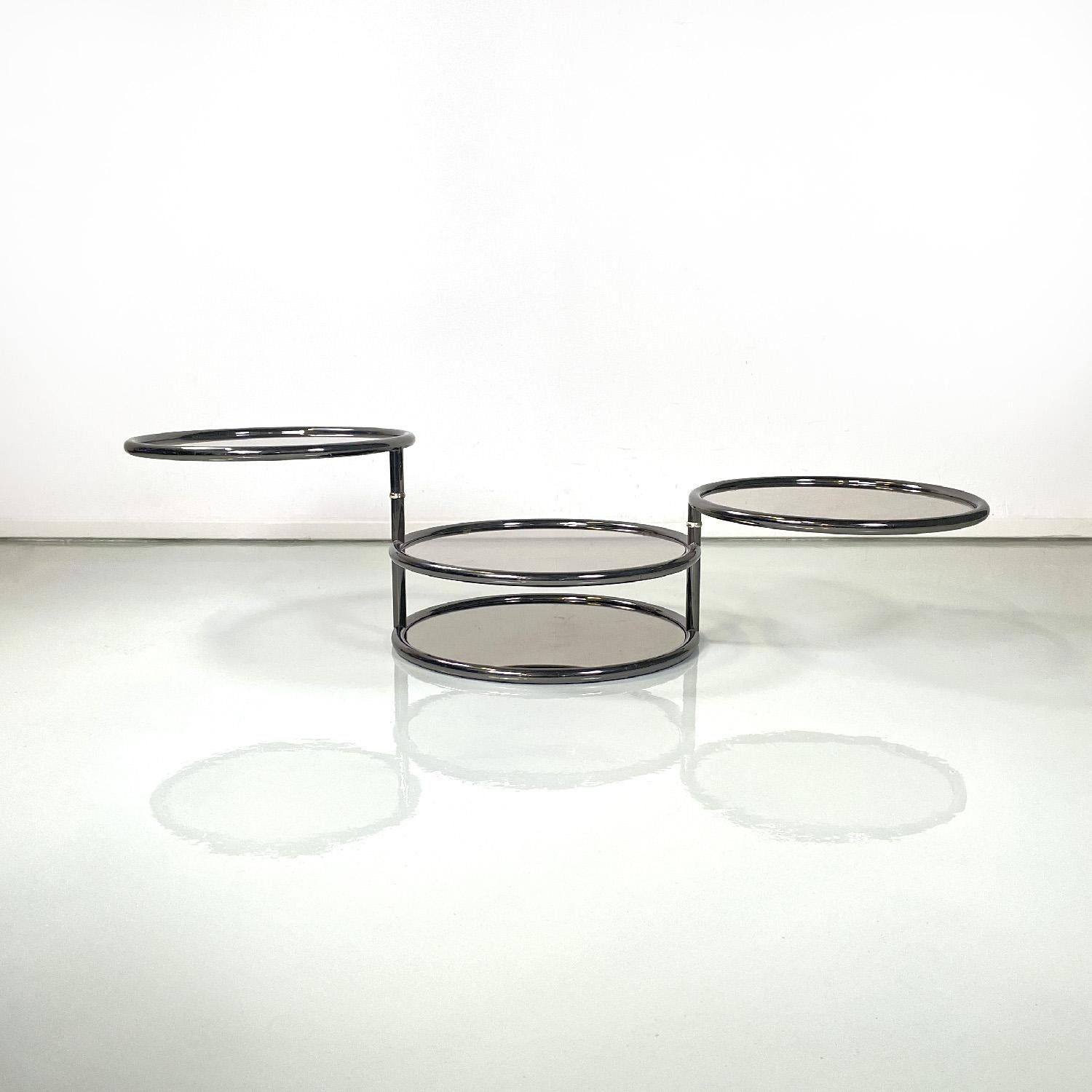 Modern Italian modern coffee table in smoked glass and metal with swivel tops, 1970s For Sale