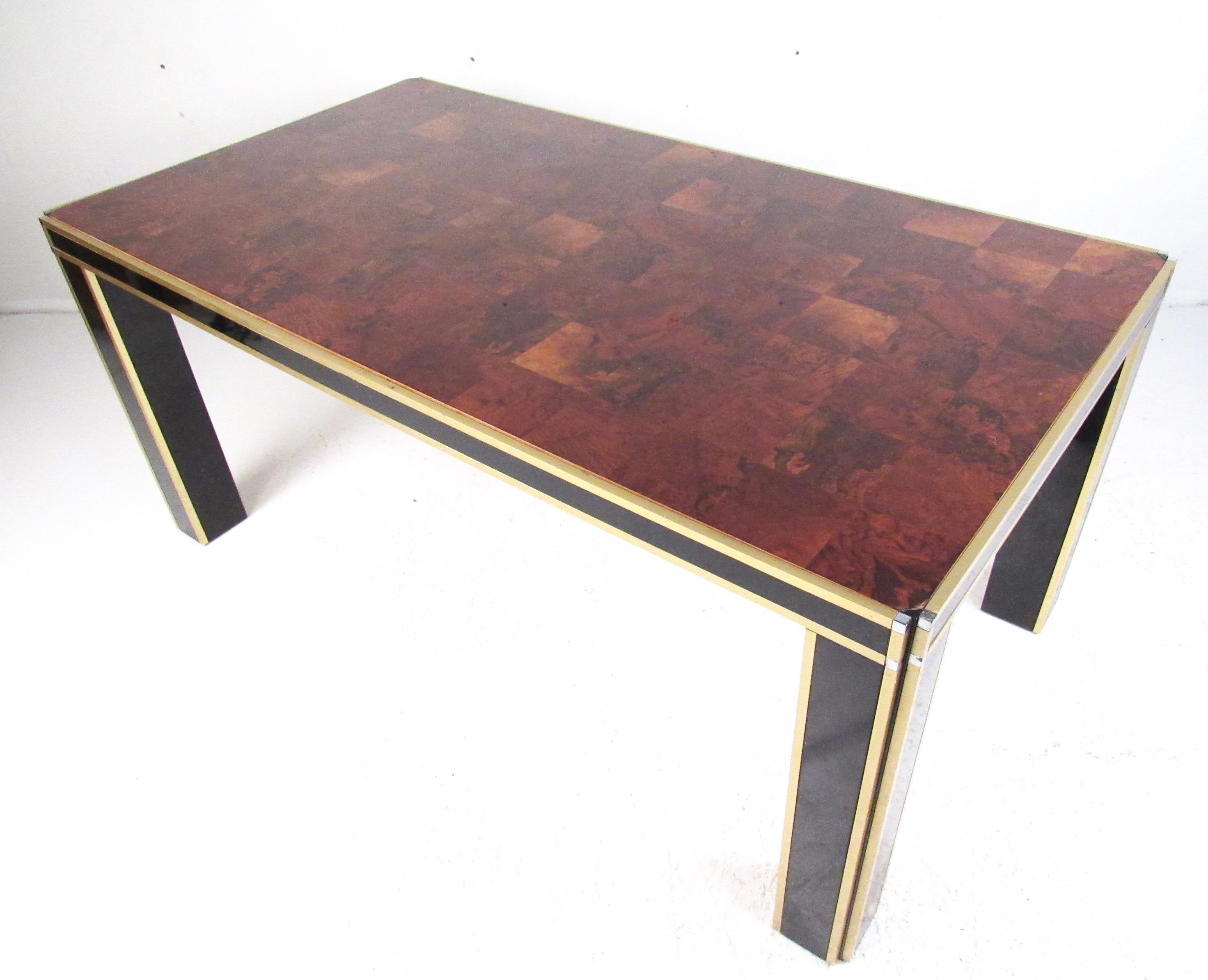 Impressive vintage modern table features metal frame with parquet burl wood top. Heavy lacquer finish adds to the stylish modern elegance of this large desk or table, while two-tone black and brass finish compliments the Italian Regency style.