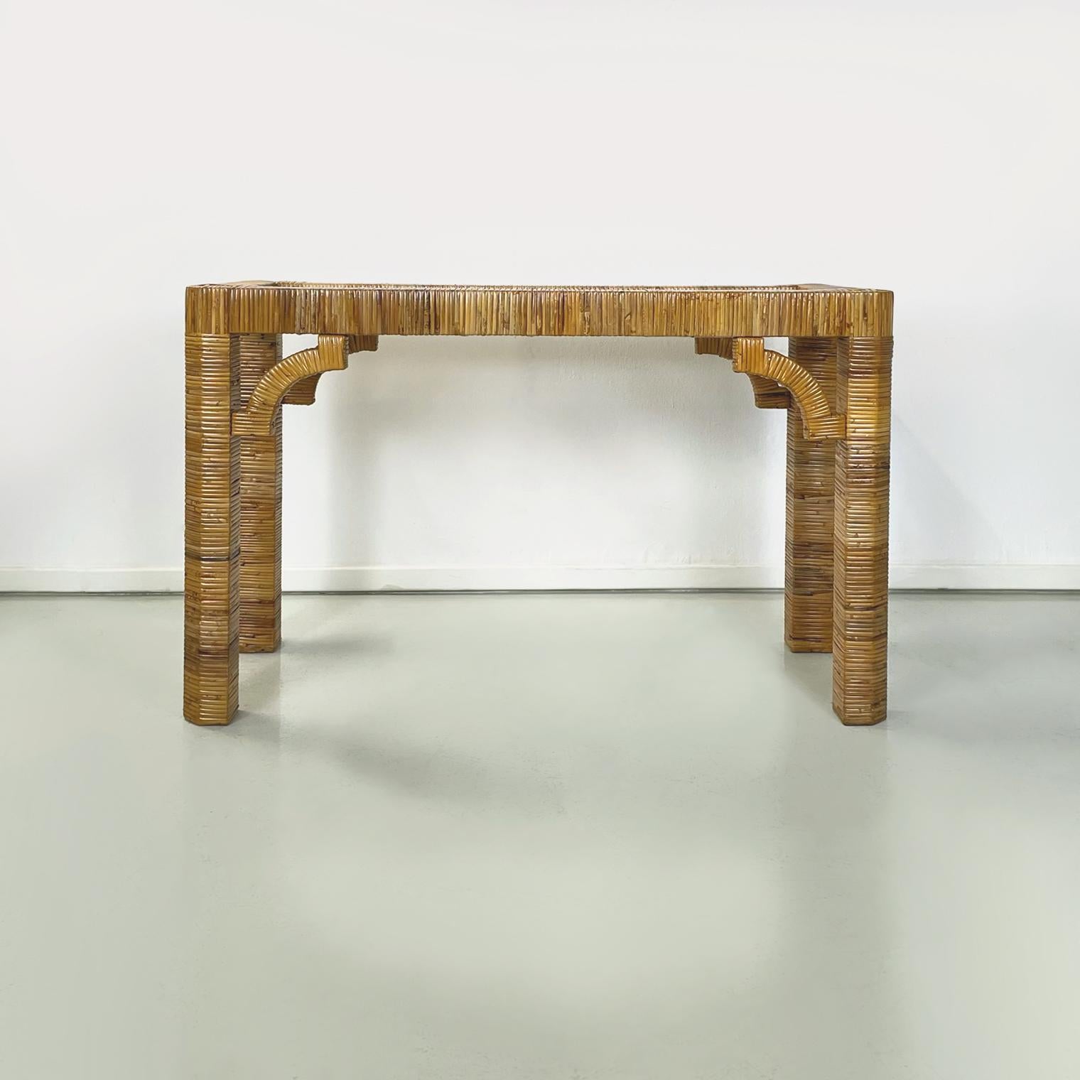 Italian modern Console Creola by Puri Purini and Mariani for Vivai del Sud 1970s
Console belonging to the Creola series in finely woven rattan. The rectangular top has a thick rattan profile and glass interior. Legs with square section, also in