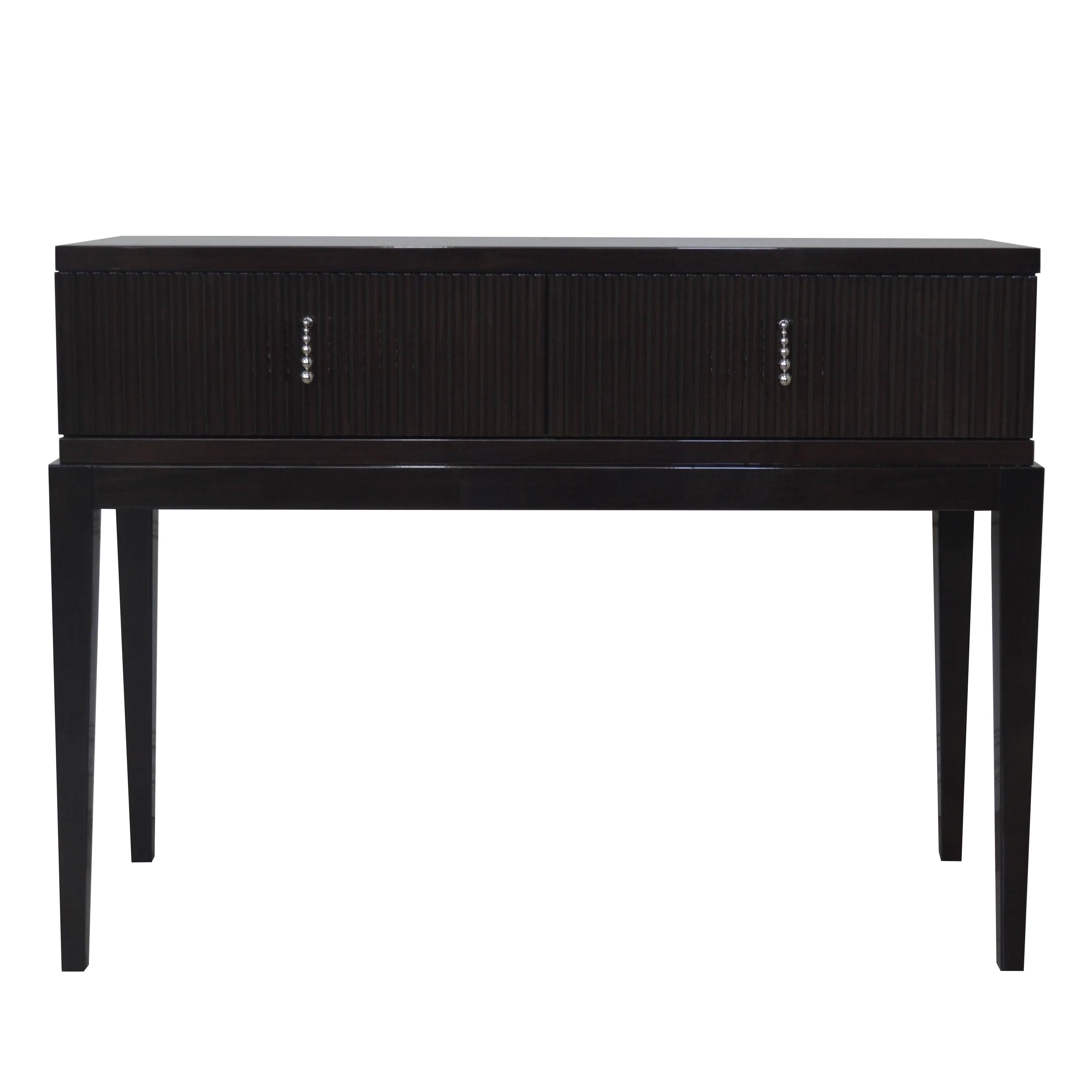 Very elegant Italian dark brown mahogany veneer console table from the style of Art Deco period supported on four legs with a high-gloss polish finish. In the style of CAVIO, with two drawers, that are upholstered inside. Its dimensions and