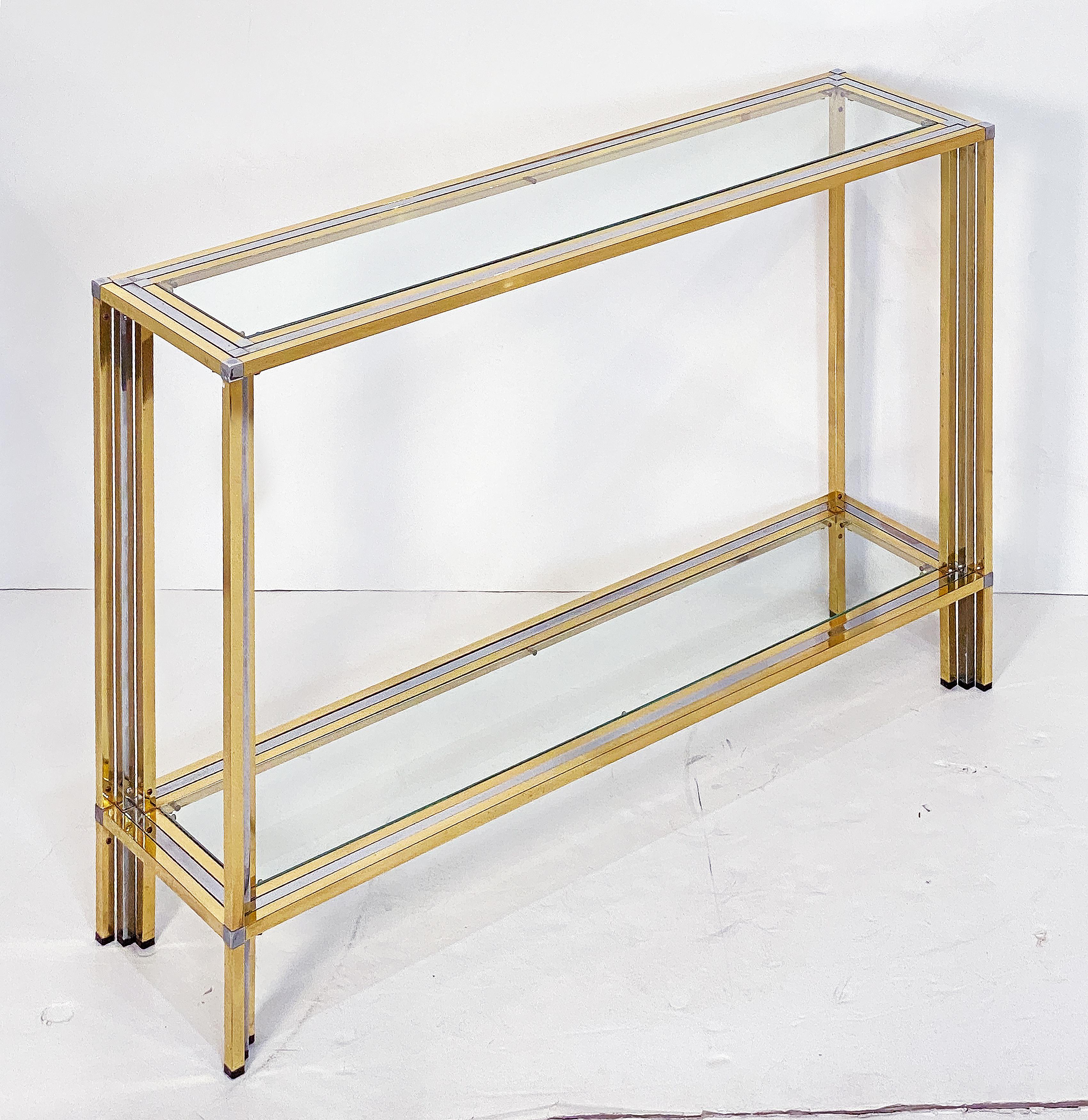 Metal Italian Modern Console Table of Brass, Chrome, and Glass by Romeo Rega For Sale