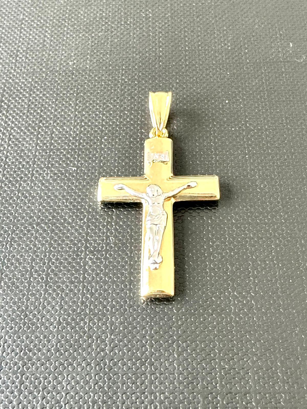 Italian jewelry craftsmanship is renowned worldwide, known for its attention to detail, fine quality, and artistic flair. Owning an Italian-made modern-contemporary 18kt yellow and white gold crucifix represents a blend of religious symbolism,