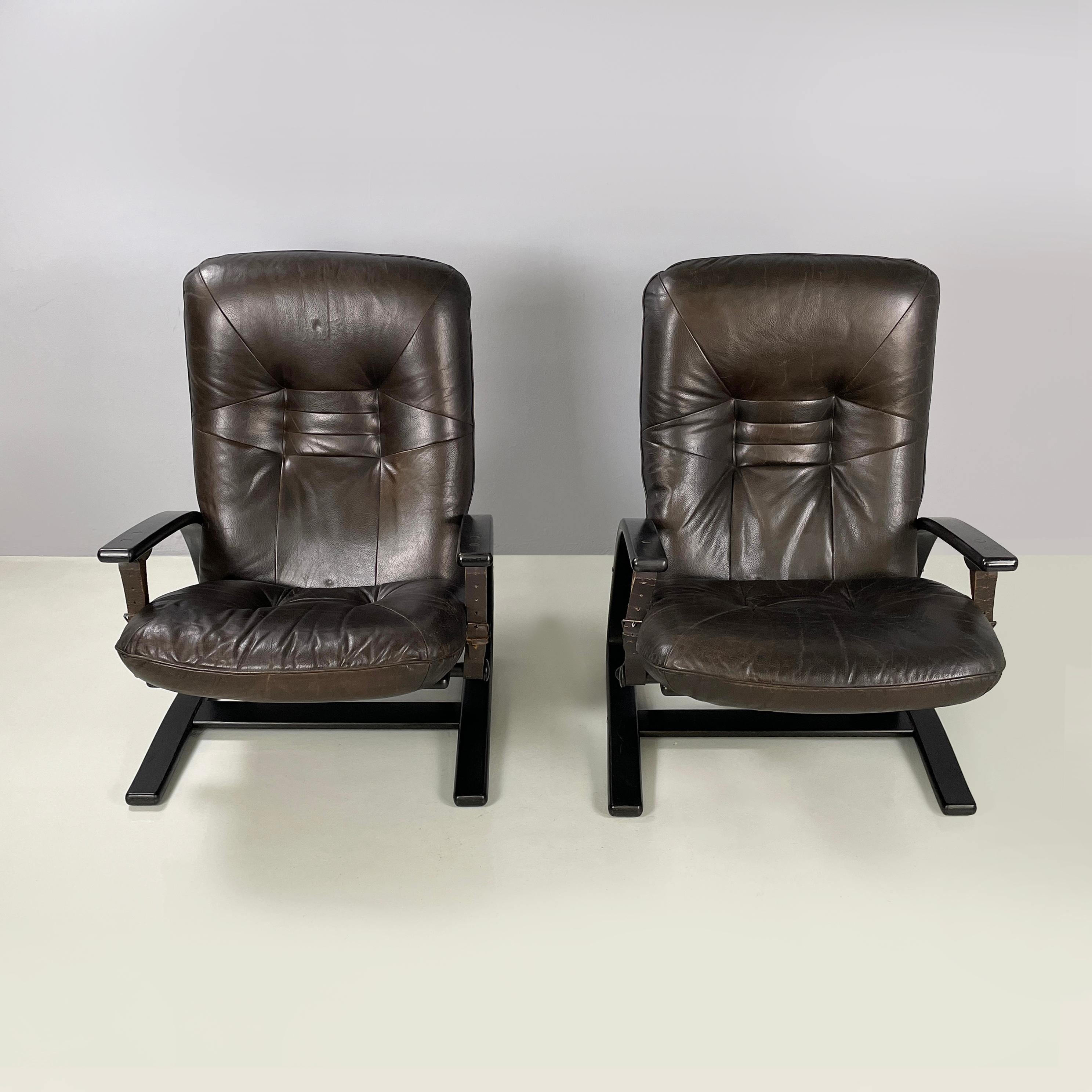 Modern Italian modern Dark brown leather Reclining armchairs and pouf by De Sede, 1970s For Sale