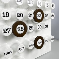 Italian modern dark brown rings for perpetual wall calendar by Ring A Date, 2020