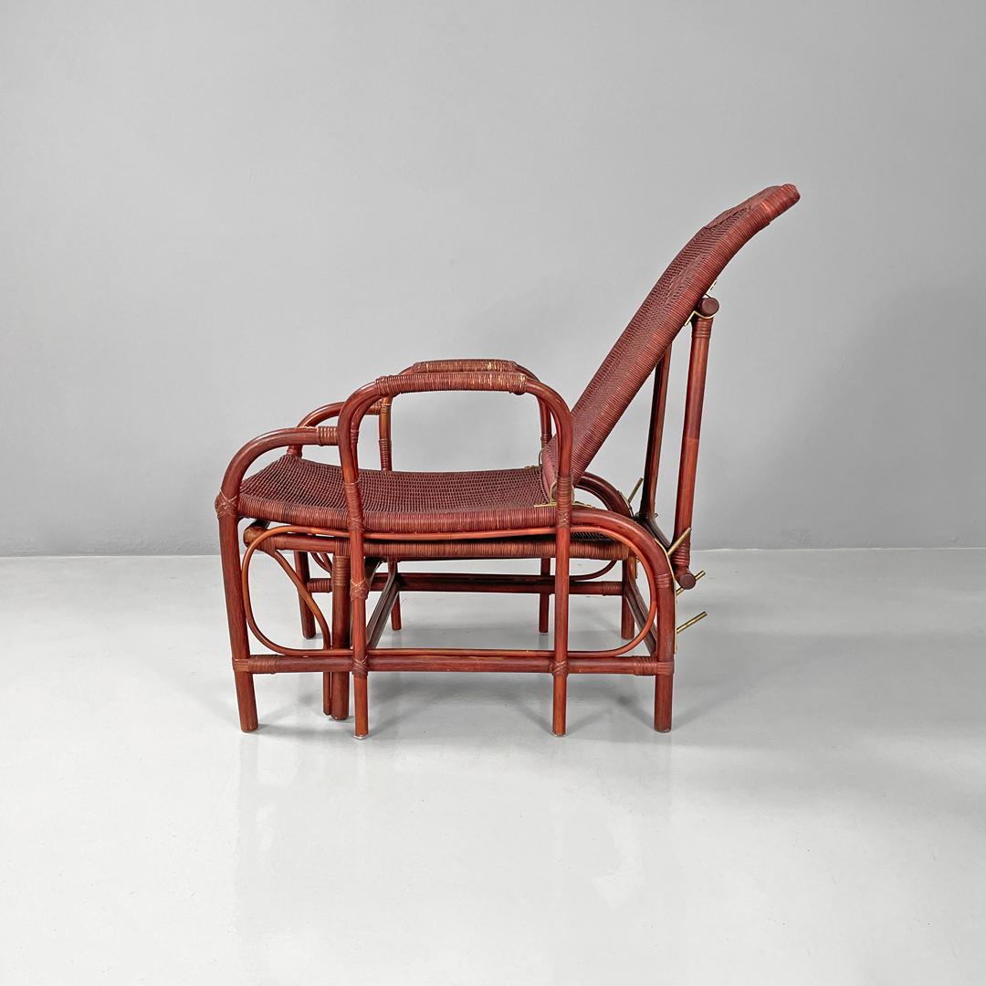Late 20th Century Italian modern dark red rattan armchair 981 with footrest by Bonacina, 1980s For Sale