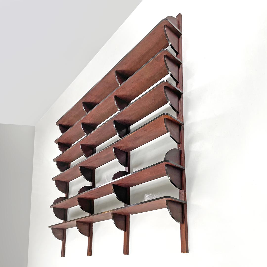 Late 20th Century Italian modern dark wood wall bookcase with black plastic details, 1980s For Sale