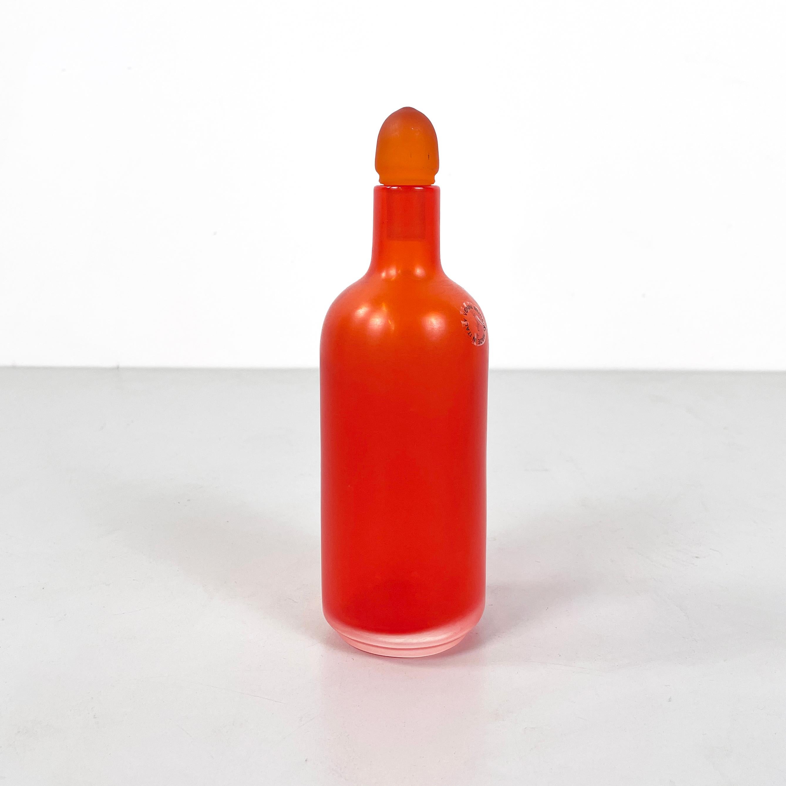 Italian modern Decorative bottle with cap in red Murano glass by Venini, 1990s
Decorative bottle with a round base in matt bright red Murano glass. The round base cap has a tapered shape.
Produced by Venini in 1990s. Label present
Very good