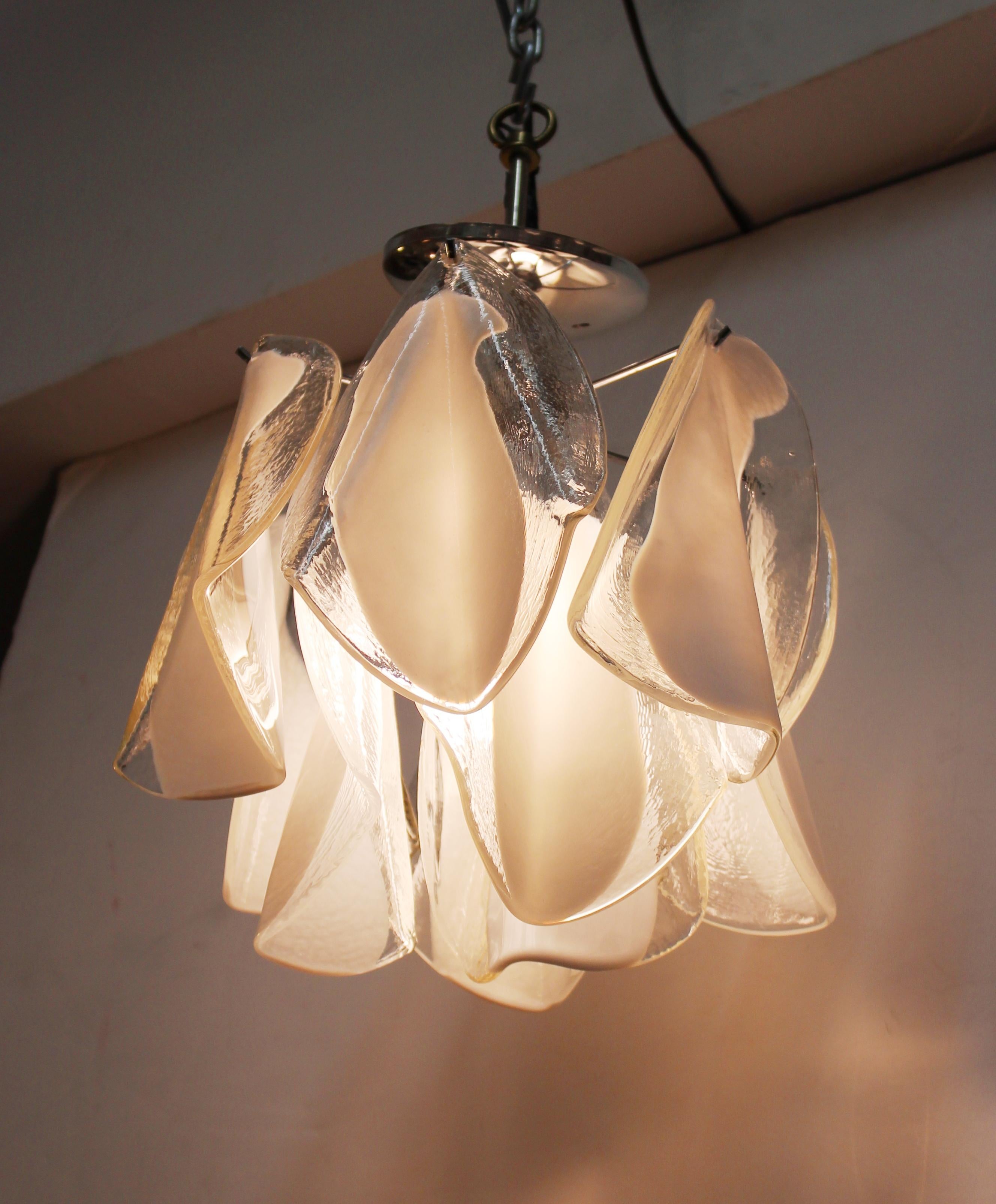 Italian modern diminutive glass handkerchief pendant light. The piece was made during the 1970s and takes one light bulb. In great vintage condition with age-appropriate wear.