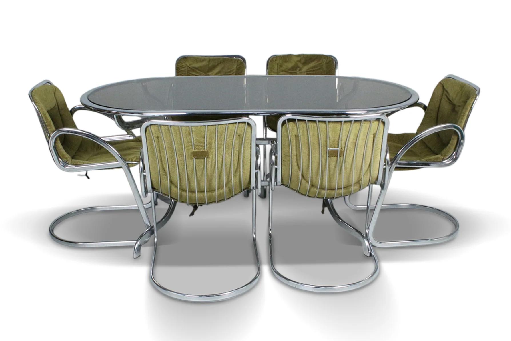 Origin: Italy
Designer: Gastone Rinaldi
Manufacturer: Rima
Era: 1970s
Materials: Chrome, Glass
Measurements: 66 (table) 19.5 (chairs)″ wide x 29 (table) 20 (chairs)″ deep x 29 (table) 31 (chairs)″ tall

Condition: In excellent original condition