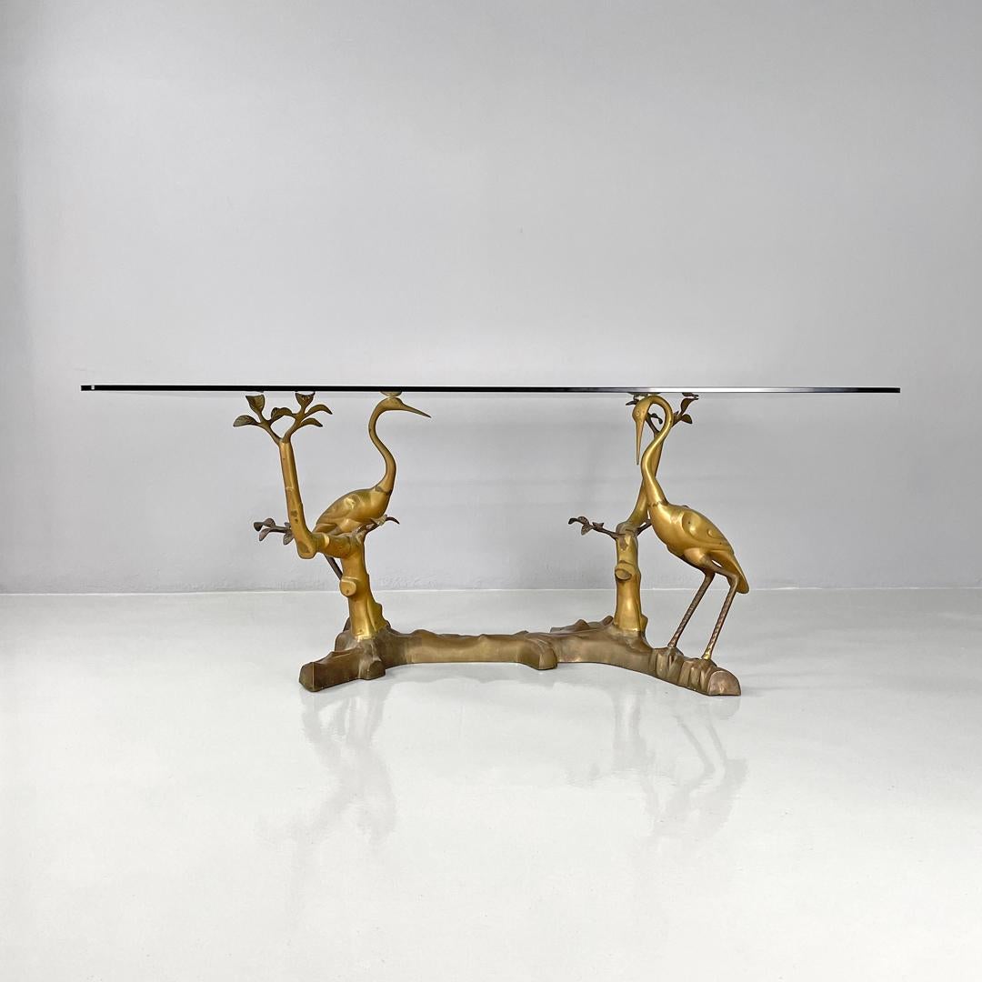 Late 20th Century Italian modern dining table with sculpted and decorated brass structure, 1970s For Sale