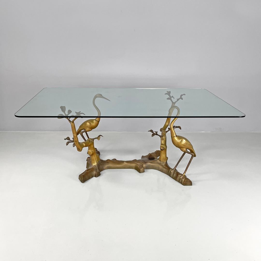Brass Italian modern dining table with sculpted and decorated brass structure, 1970s For Sale