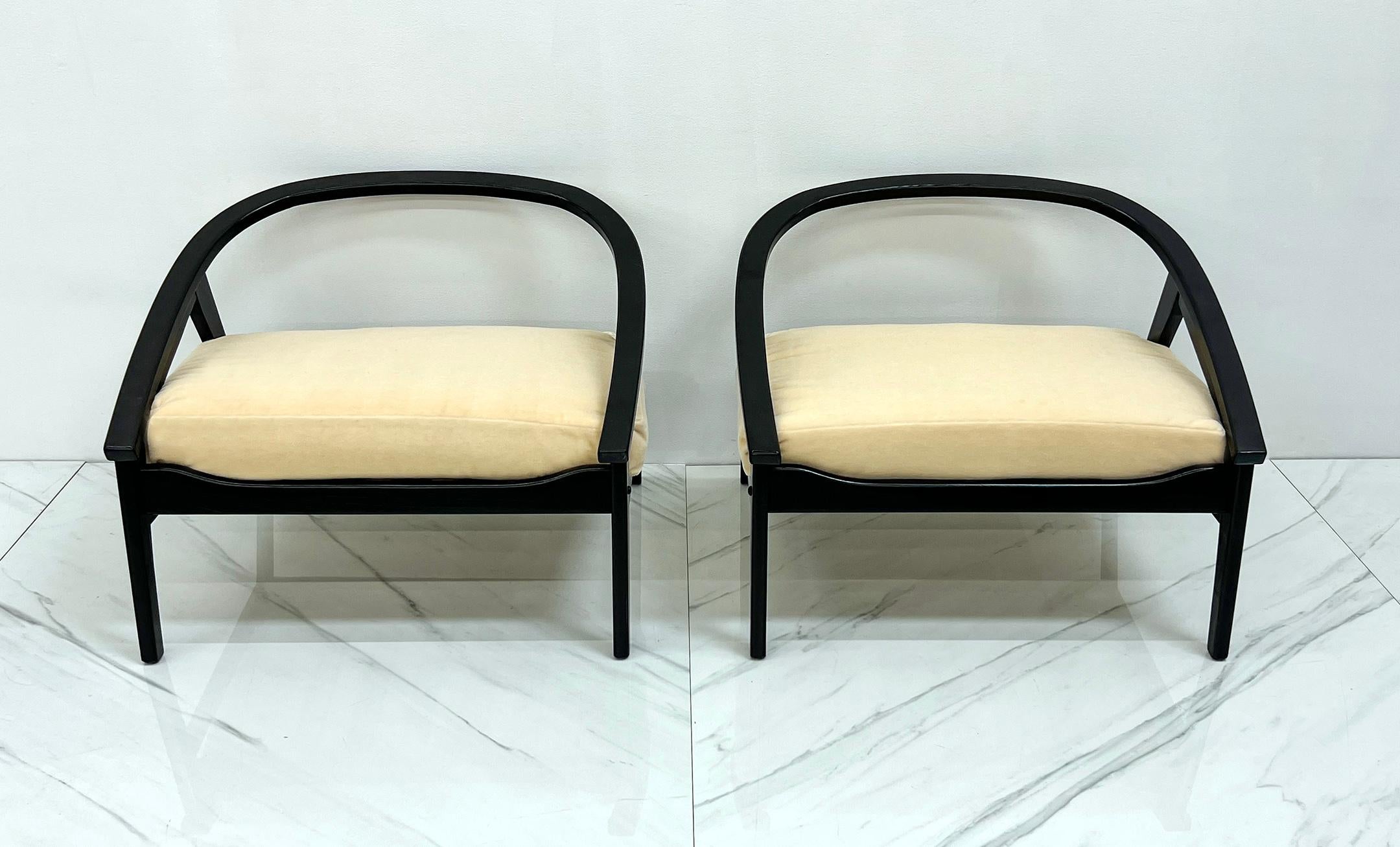 Introducing a captivating pair of horseshoe-shaped lounge chairs, hailing from the vibrant design era of 1970s Italian modernism. These exquisite chairs exude a timeless elegance and possess a seamless fusion of comfort, style, and craftsmanship.