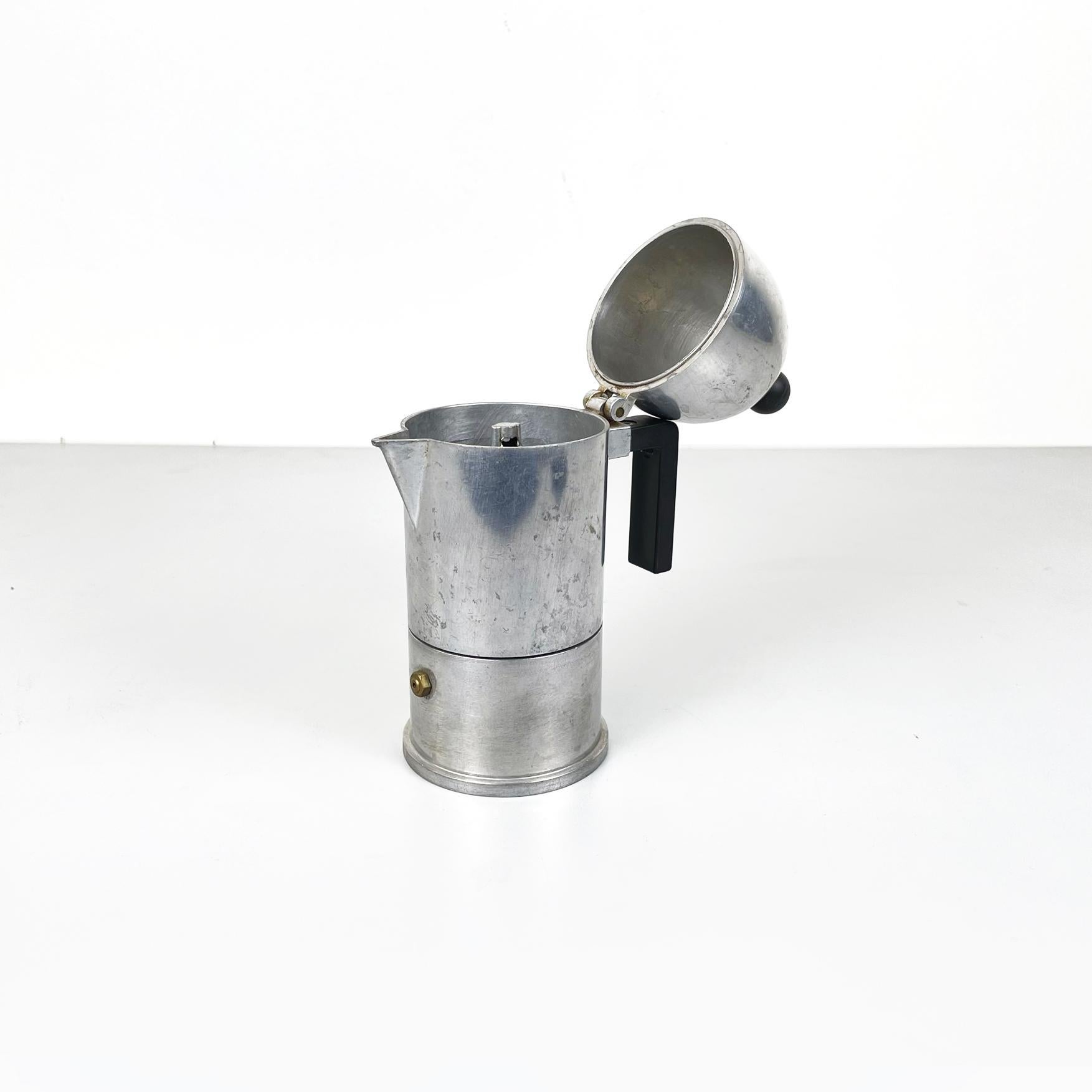 Italian modern Espresso coffee maker La Cupola by Aldo Rossi for Alessi, 1990s
Espresso coffee maker mod. La Cupola with a round base in cast aluminium. It has a handle and a spherical knob on the top, in black plastic. On the front it has a