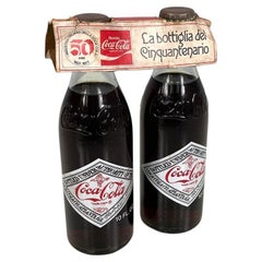 Retro Italian modern fiftieth anniversary Coca-Cola glass bottles, 1977
