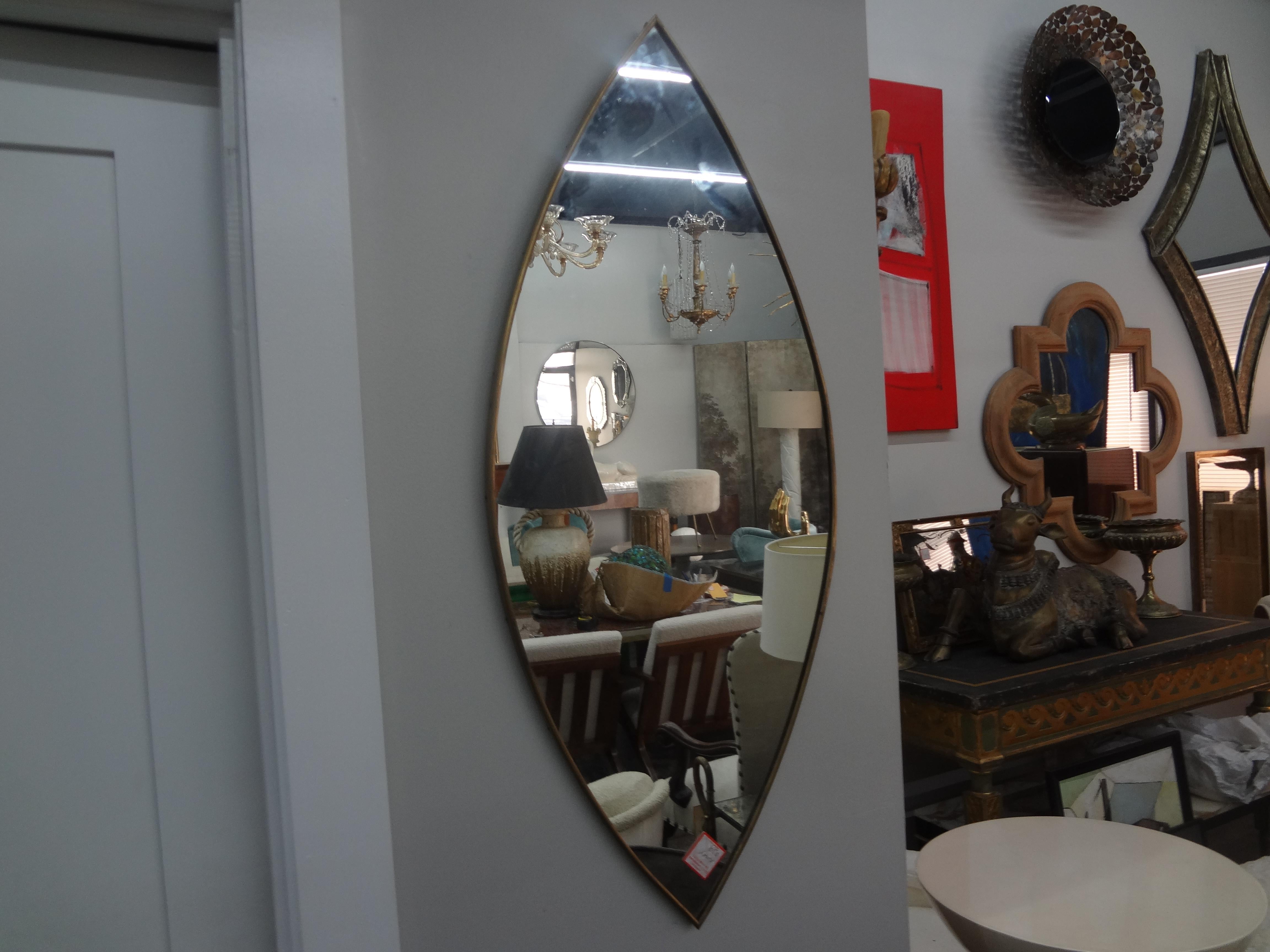 Italian Modern Gio Ponti Inspired Brass Mirror.
Our stunning shapely Italian brass mirror would be perfect in a powder room or dressing room.
Lovely!