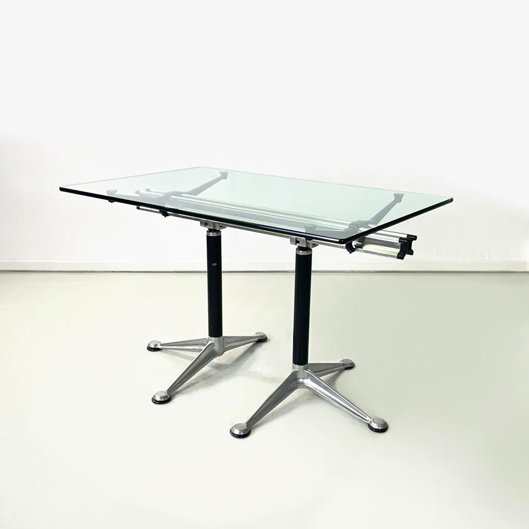 Italian modern glass and aluminum dining table by Bruce Burdick for Tecno, 1980s 
Dining table with rectangular glass top. The structure is composed by a central part in aluminum with four arms that supports the top. Black metal legs with round