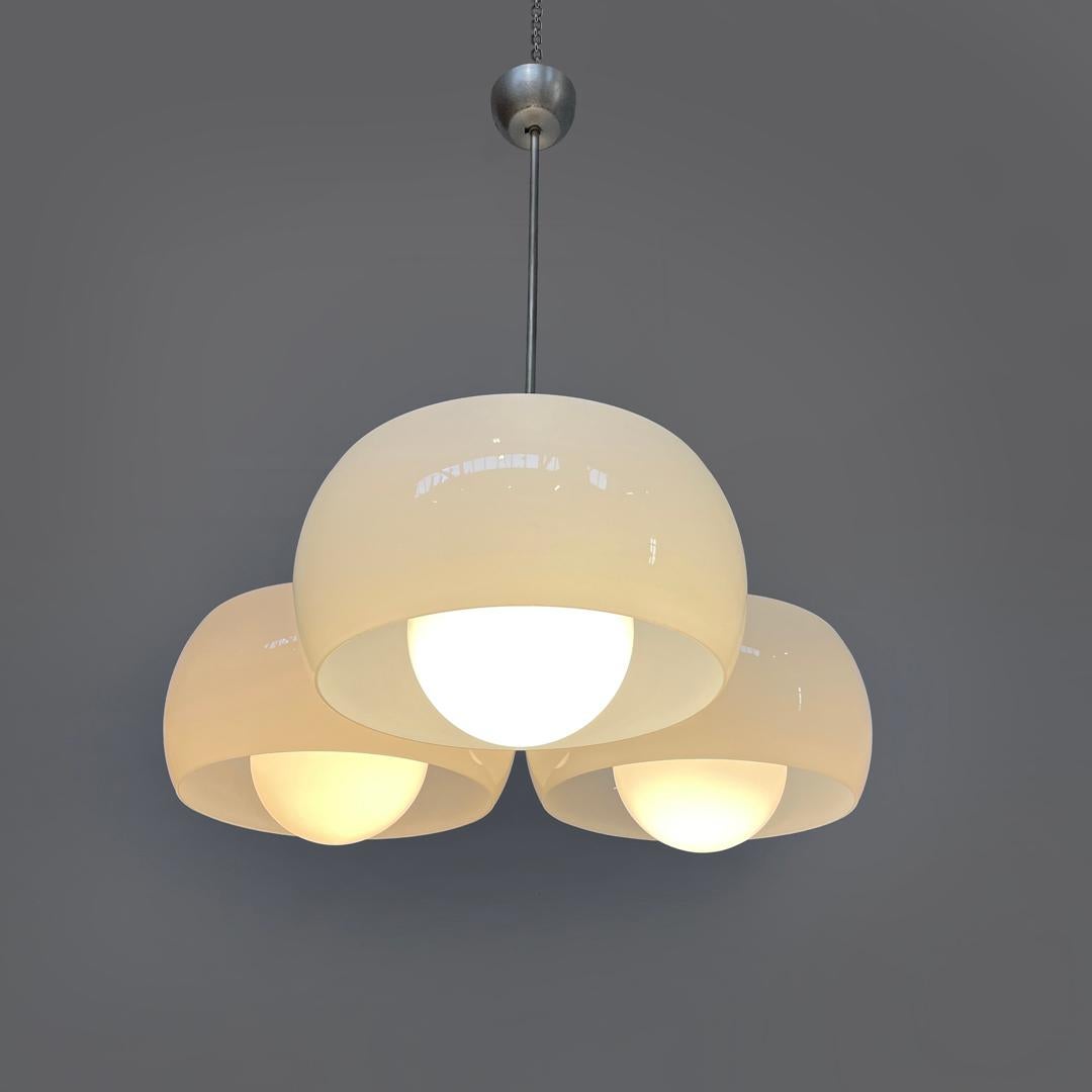 Italian modern glass brass chandelier Triclinio Vico Magistretti Artemide, 1970s
Ceiling lamp or chandelier mod. Triclinio, with structure composed of three lights with rounded cylindrical diffuser and with sphere inside each of the diffusers, in