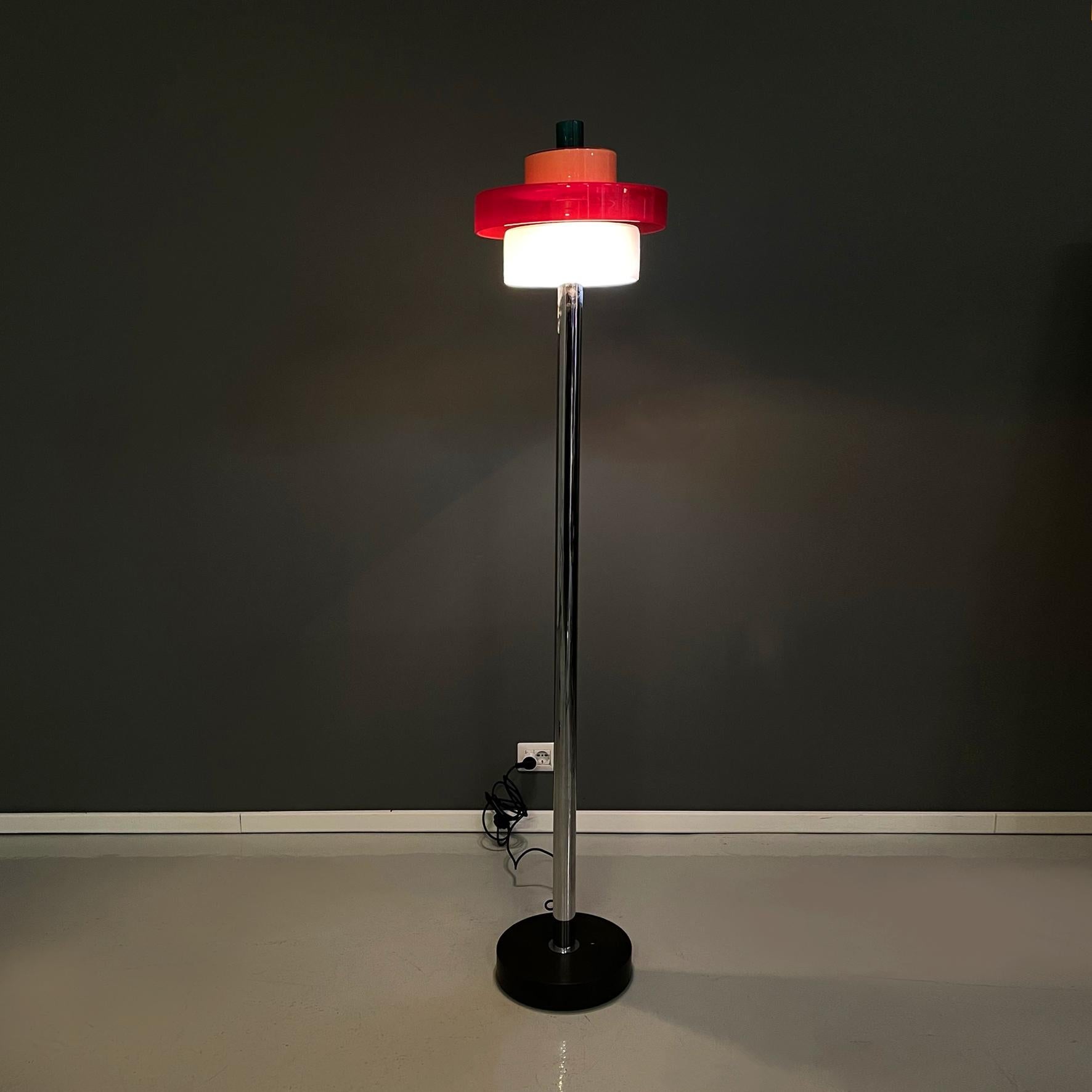Italian modern Glass Floor lamp Allarnisam by Ettore Sottsass for Venini, 1990s
Floor lamp mod. Allarnisam with diffuser composed of 4 cylinders of different sizes, stacked on top of each other, in green, yellow, red and white colored glasses. The