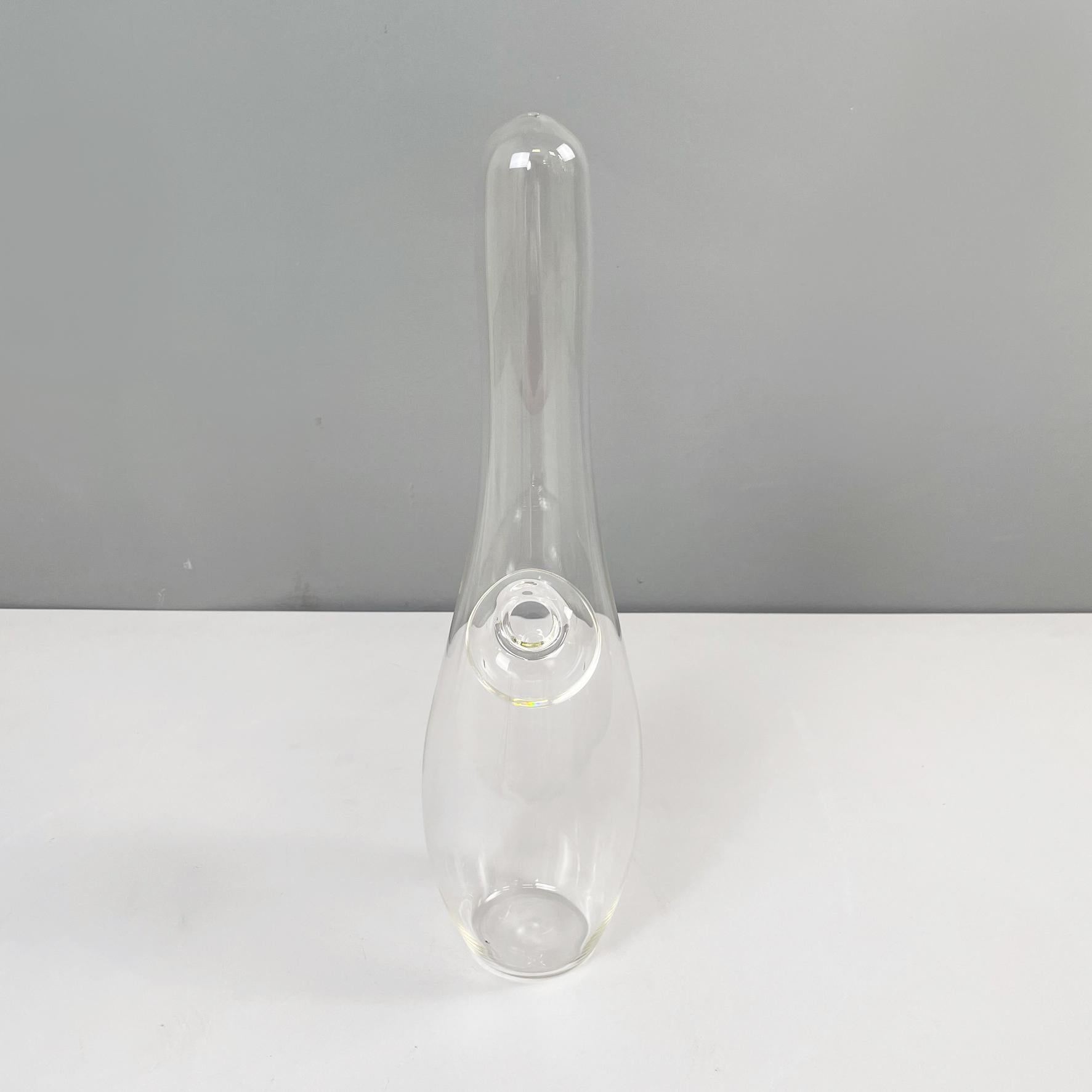 Italian modern Glass vase with irregular and round shape by Roberto Faccioli, 1990s
Round base vase in finely handcrafted glass. The structure has an irregular and rounded shape. Inside it has a sphere with a side hole.
Designed and produced by