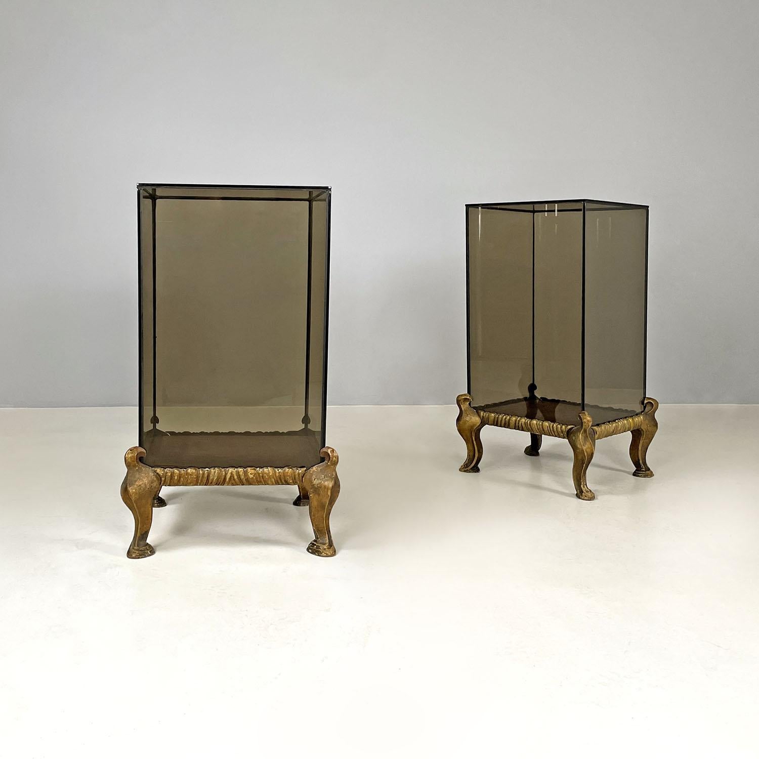 Italian modern golden wood and grey glass coffee tables or pedestals, 1970s
Pair of square-based coffee tables. The wooden base is decorated and sculpted and is painted in a golden color, it has four shaped legs with curved lines. A structure with a
