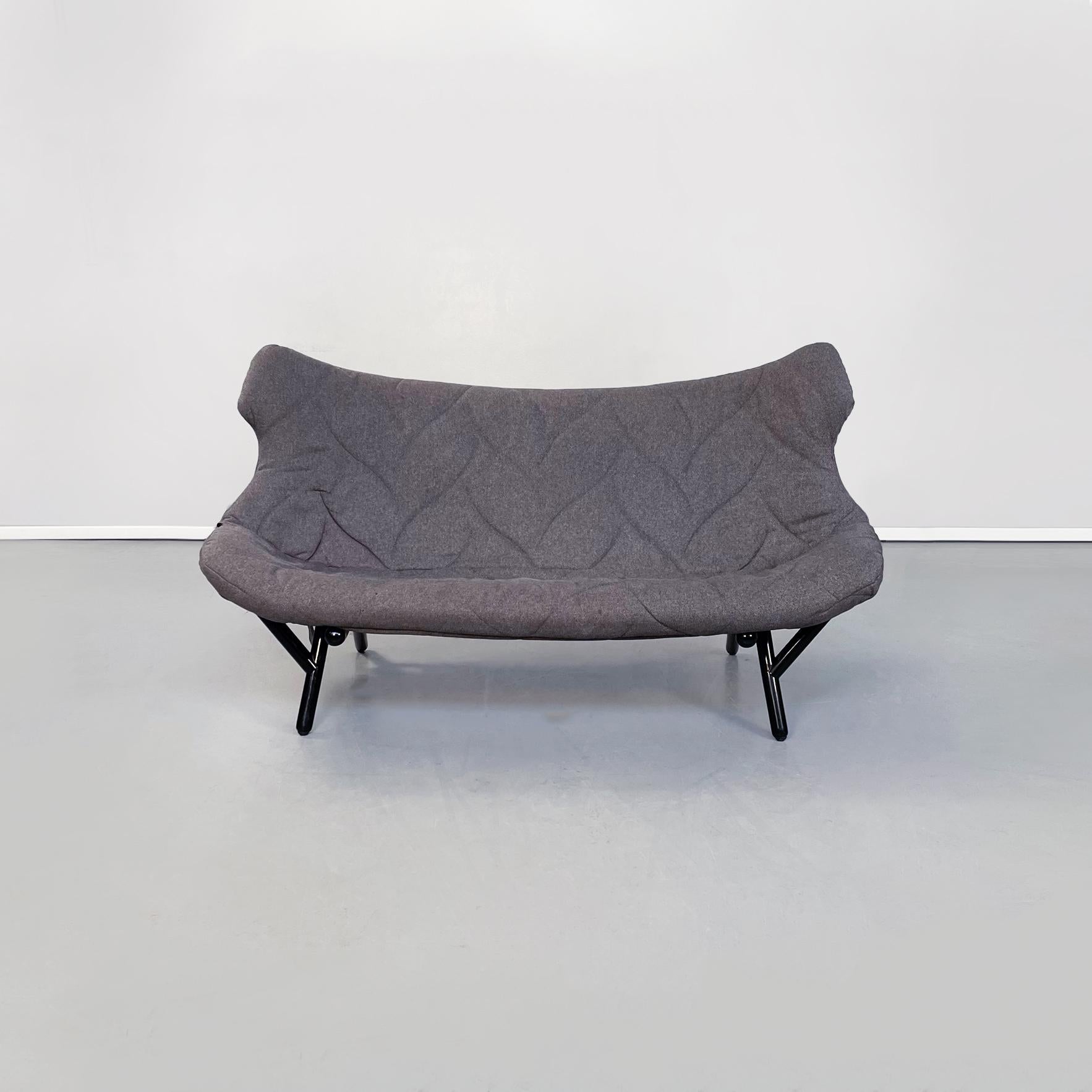 Italian modern Grey fabric and black iron Foliage sofa by Kartell, 2000s
Two seater Foliage sofa with tubular structure in black painted iron. The seat and back are padded with polyurethane foam, covered in gray fabric on which the shapes of leaves