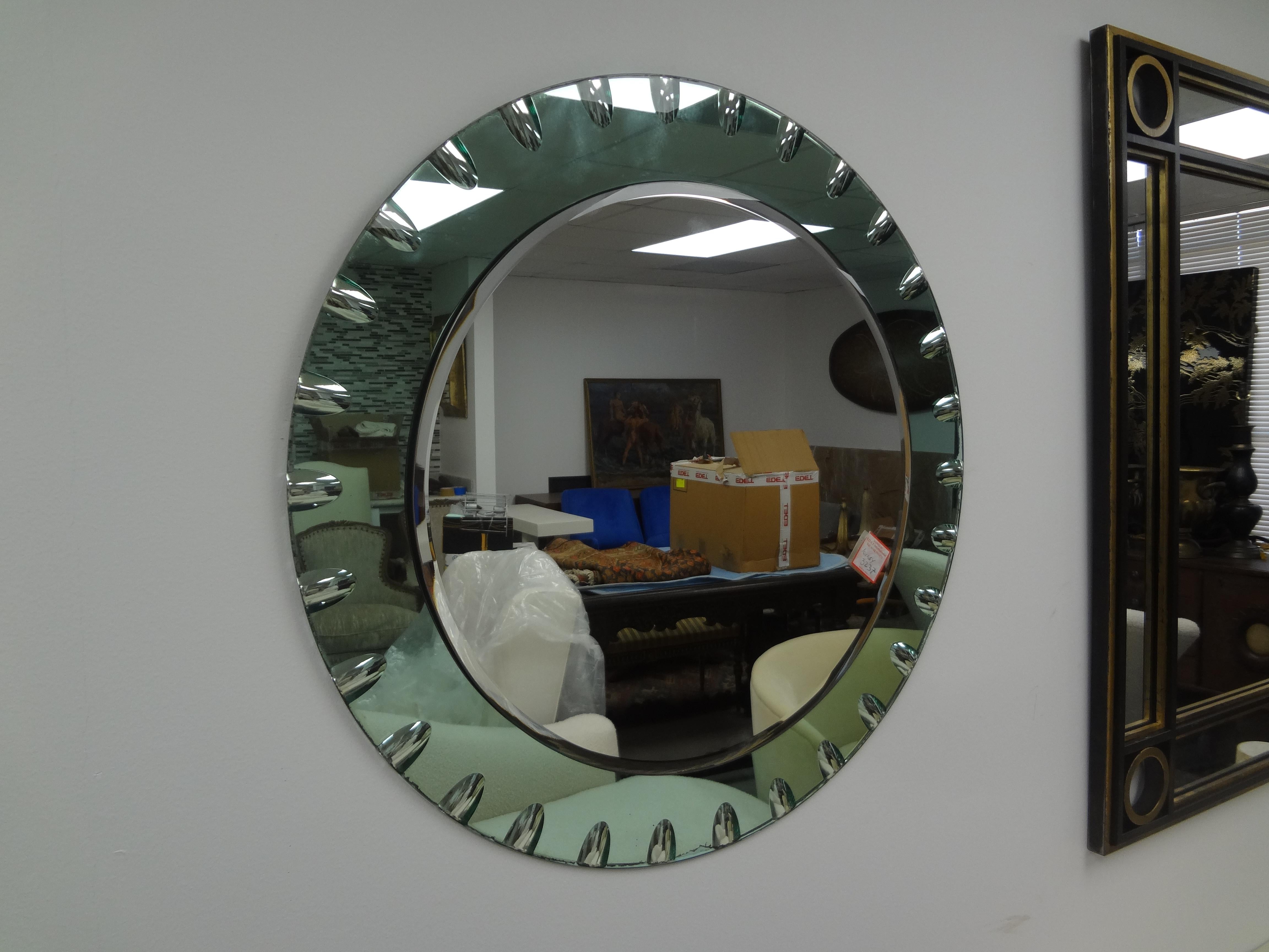 Italian Modern Green Beveled Mirror Inspired By Fontana Arte
This lovely Fontana Arte style mirror has a decorative indented design around the perimeter.
Most unusual!