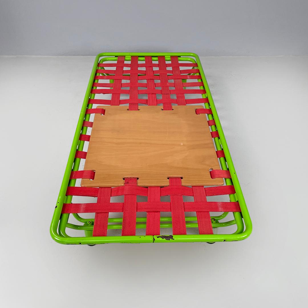 Metal Italian modern green daybed or bed in metal and wood with red straps, 1980s For Sale