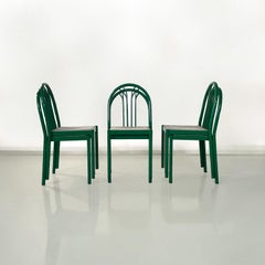 Italian modern green tubular metal and grey straw stackable chairs, 1980s