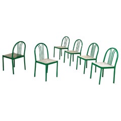 Italian modern green tubolar metal and grey straw chairs stackable, 1980s