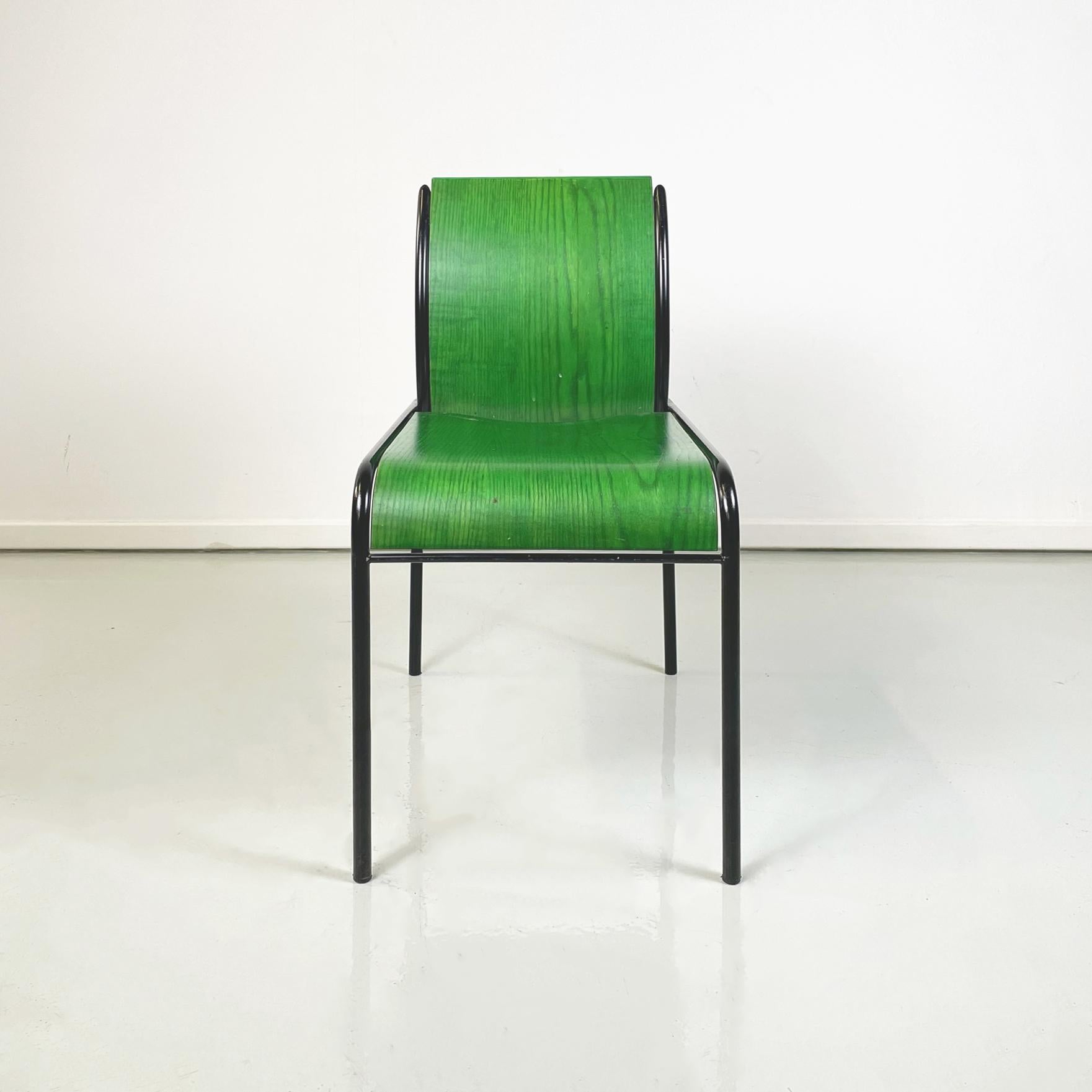 Italian modern Green wood and black metal Chair mod. Kim by Michele De Lucchi for Memphis, 1980s
Fantastic chair mod. Kim with the seat and the back in bright green painted wood. The rectangular seat is rounded on the front. The backrest is curved.