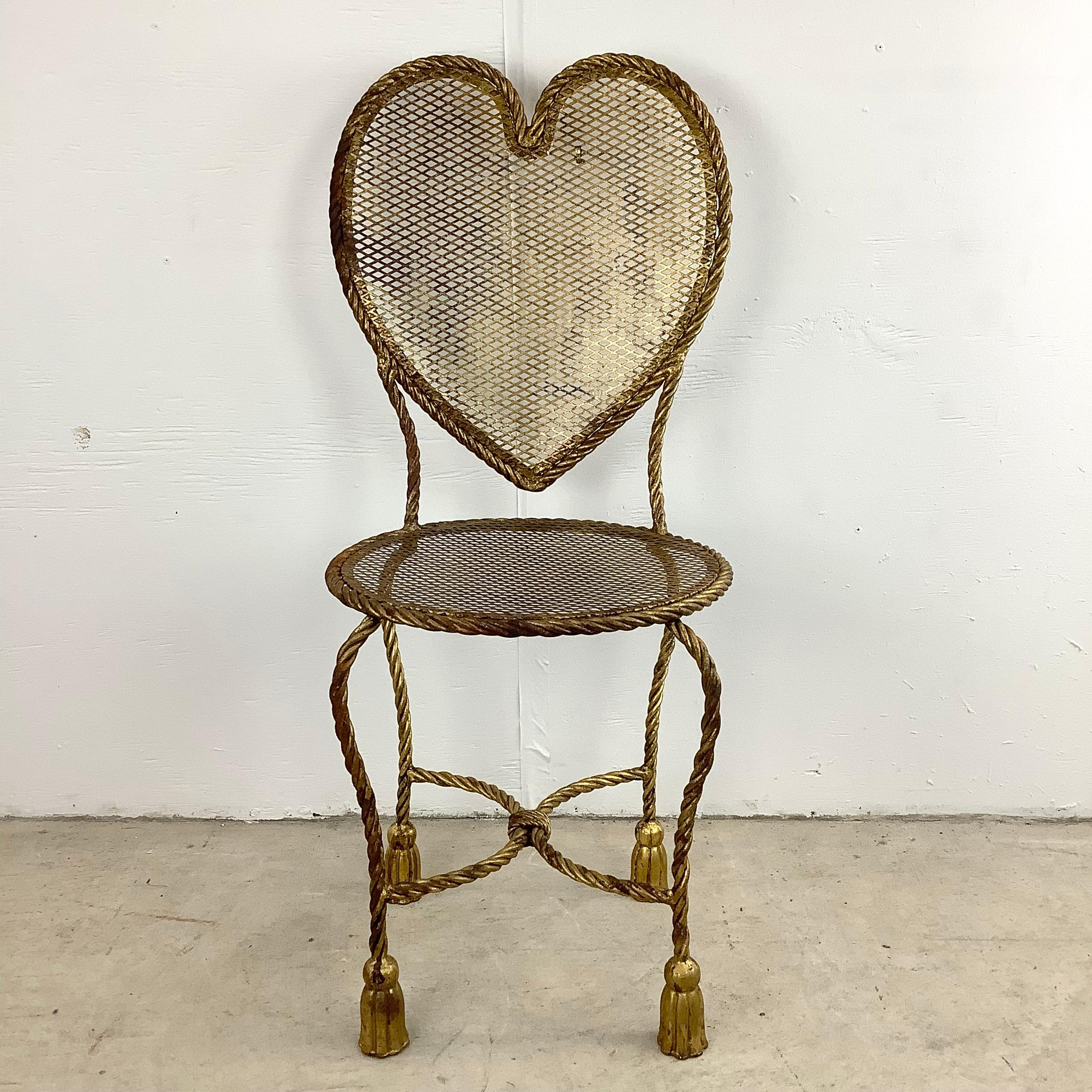 Step into a world of timeless sophistication with this exquisite Vintage Italian made Heart Chair. This chair encapsulates the essence of Italian craftsmanship and artistic finesse that has charmed connoisseurs for generations.

Indulge in the