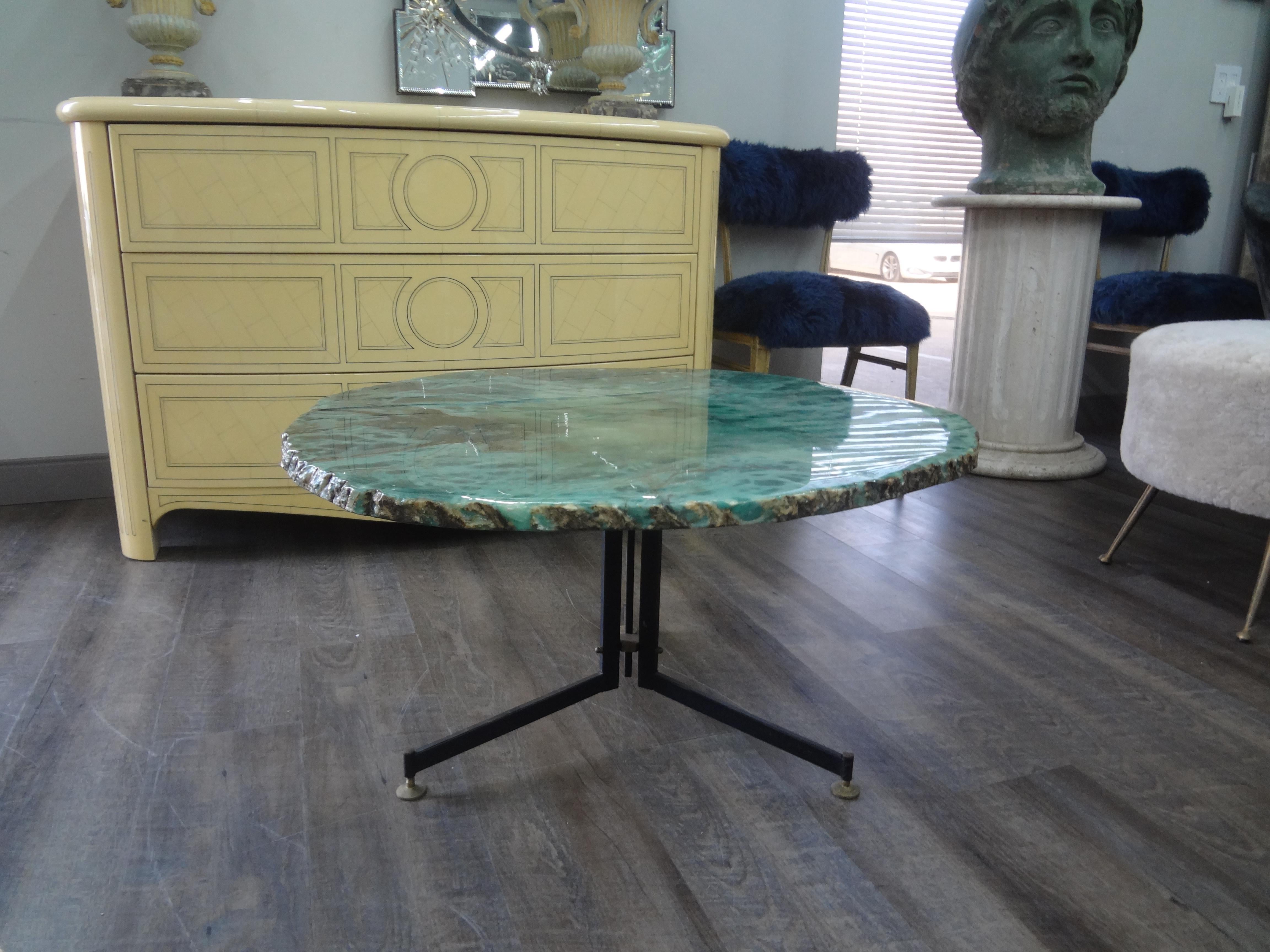 Italian Modern Gio Ponti Inspired Iron and Alabaster Coffee Table.
This shapely Italian Mid-Century Modern coffee table or cocktail table has a iron and brass base with a freeform aqua alabaster top. 
Can be used as a side table or end table.
One of