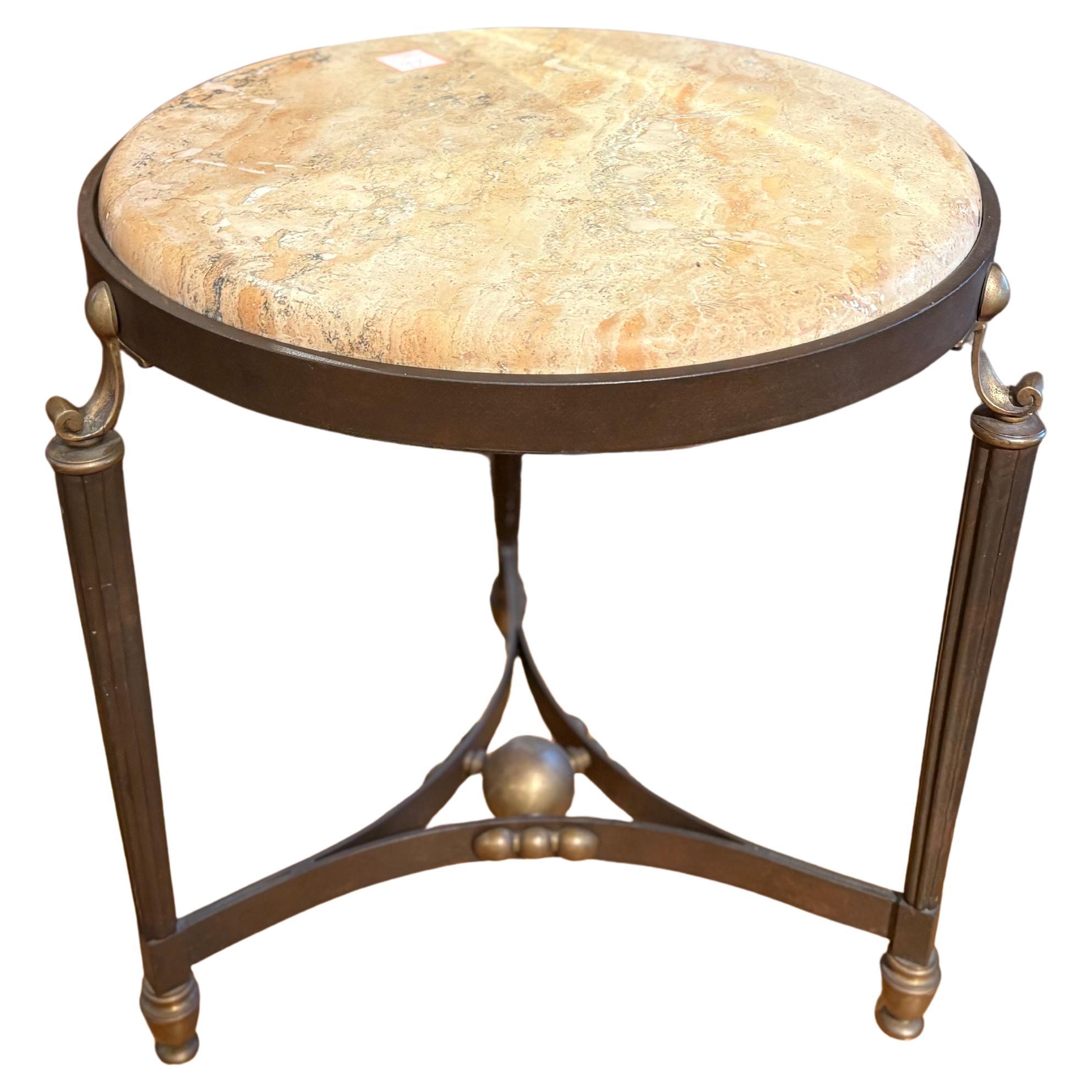 Italian Modern Iron And Bronze Table.
Offered is a handsome Italian mid century iron and bronze table, drink table, side table or lamp table with a thick travertine top.
This table is the perfect table for between two chairs, a sofa or loveseat and
