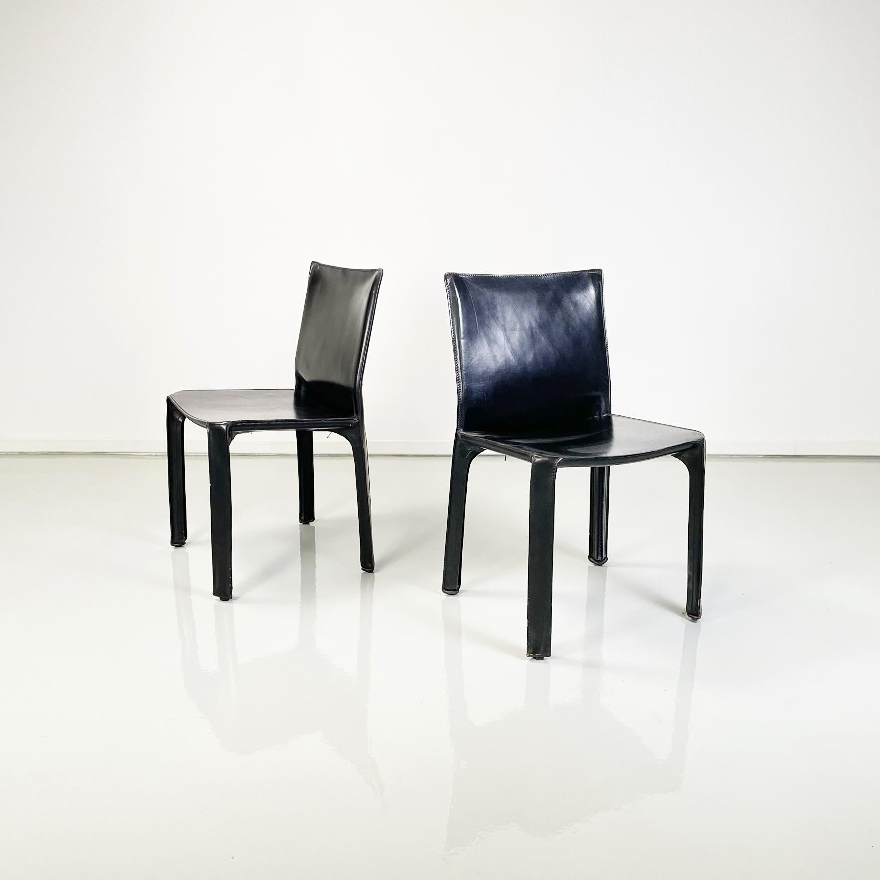 Italian modern Leather chairs mod CAB 414 by Mario Bellini for Cassina, 1980s 
Set of fantastic and comfortable 6 chair mod. CAB 412 in black leather. The leather follows the shapes of the seat, back and square legs. Exposed seams. Under the seat