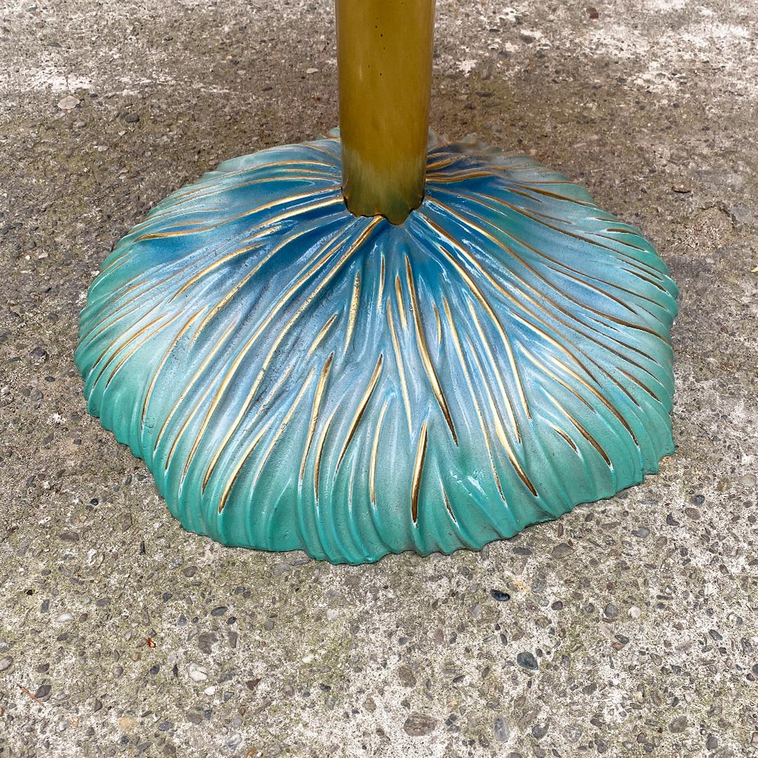 Italian post modern small round light blue table in ceramic with engraved design and brass, probably 1980s period

Incredible beauty for this round-shaped table, the charactheristic top in ceramic top engraved design and iridescent color give a big